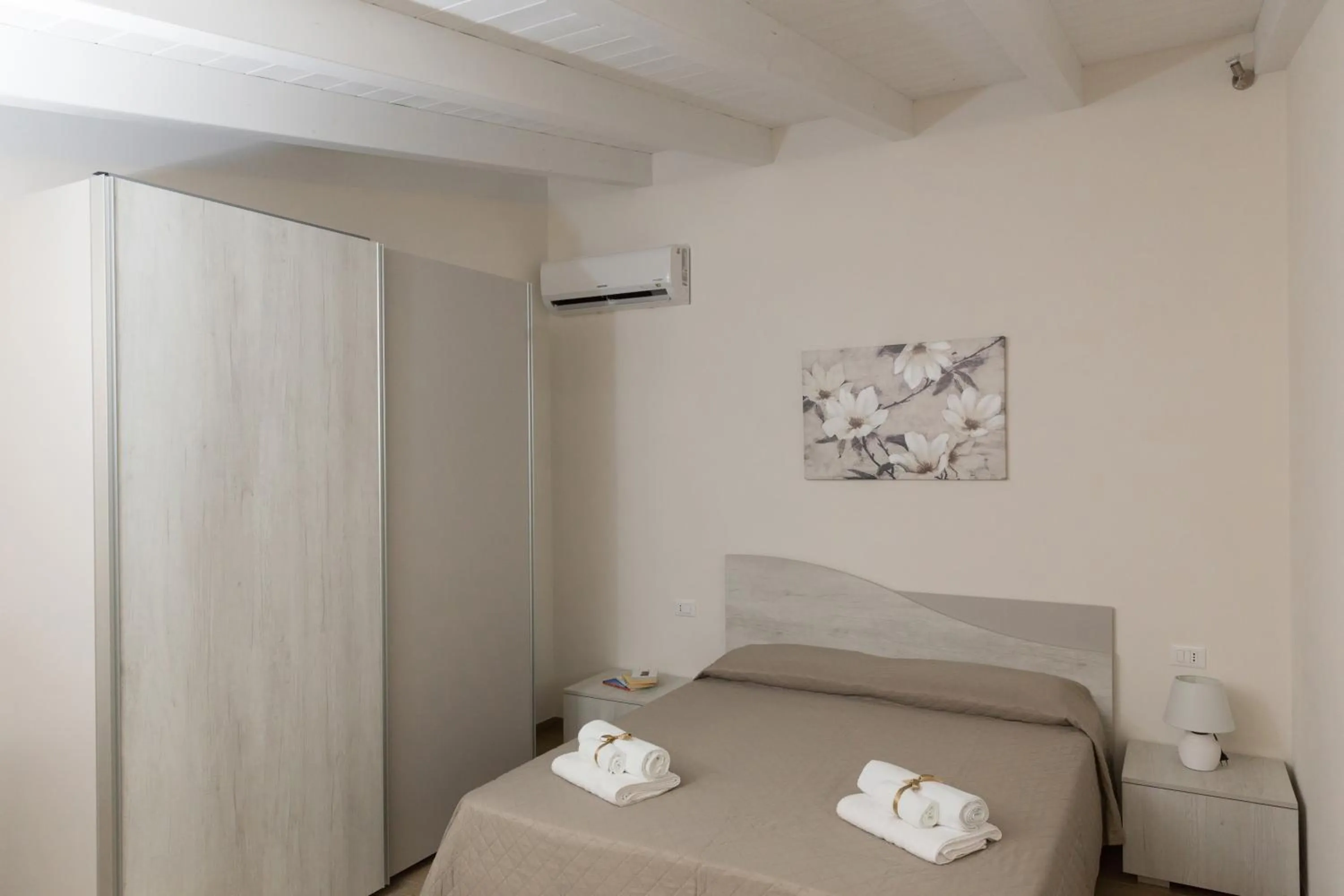 Bed in Case Vacanza Le Maioliche