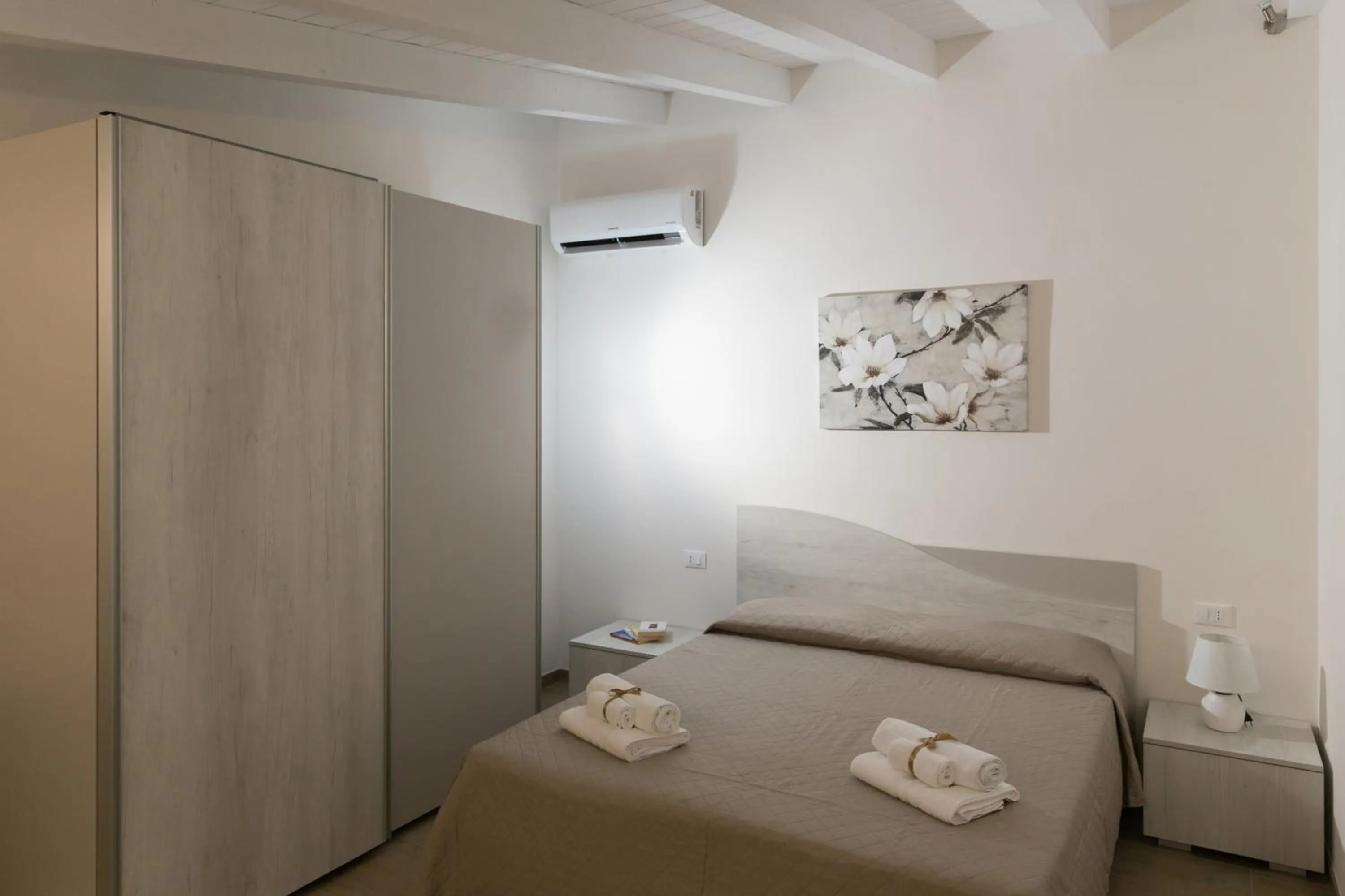 Bed in Case Vacanza Le Maioliche