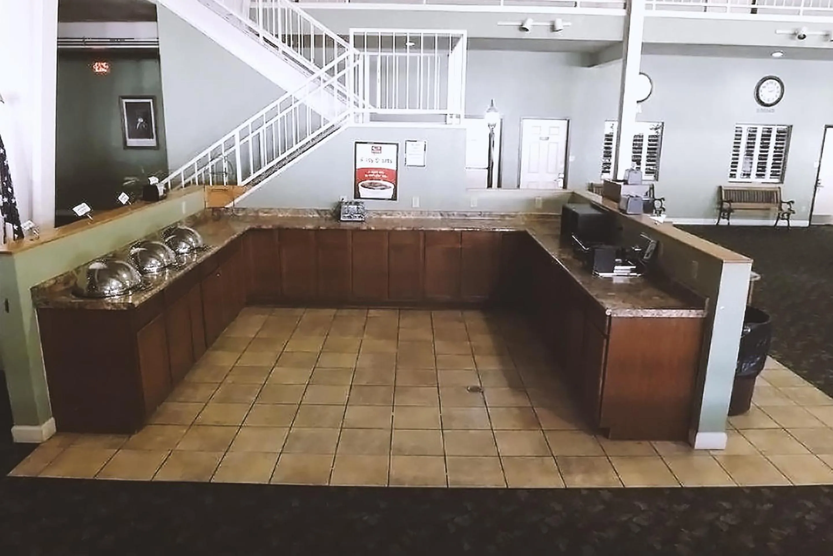 Dining area in Coratel Inn & Suites by Jasper McCook