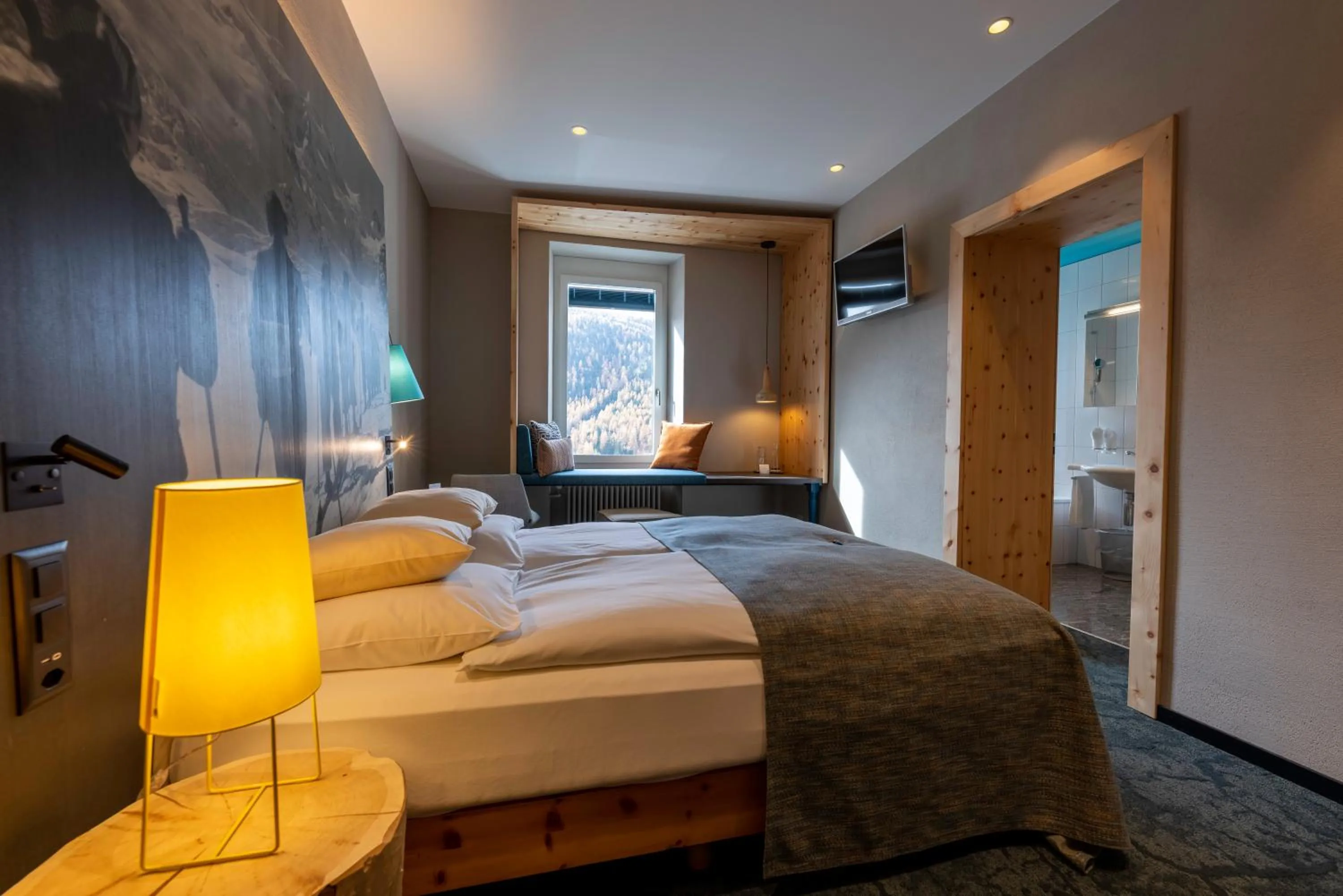 Photo of the whole room, Bed in Sporthotel Pontresina