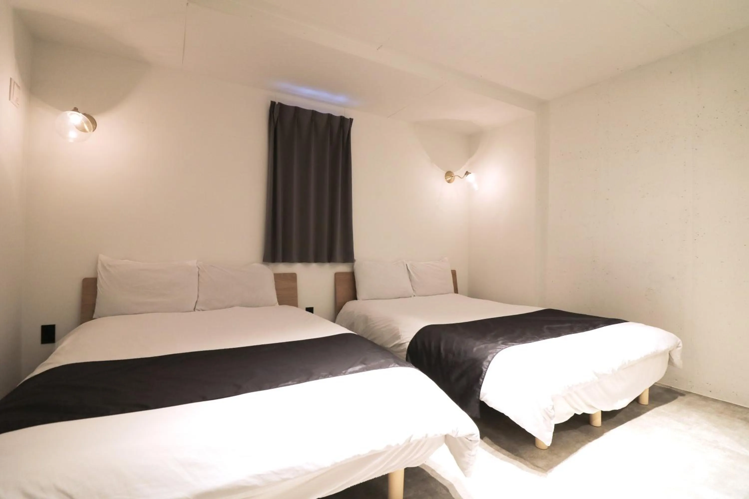 Bed in HOTEL WHEAT WACCA