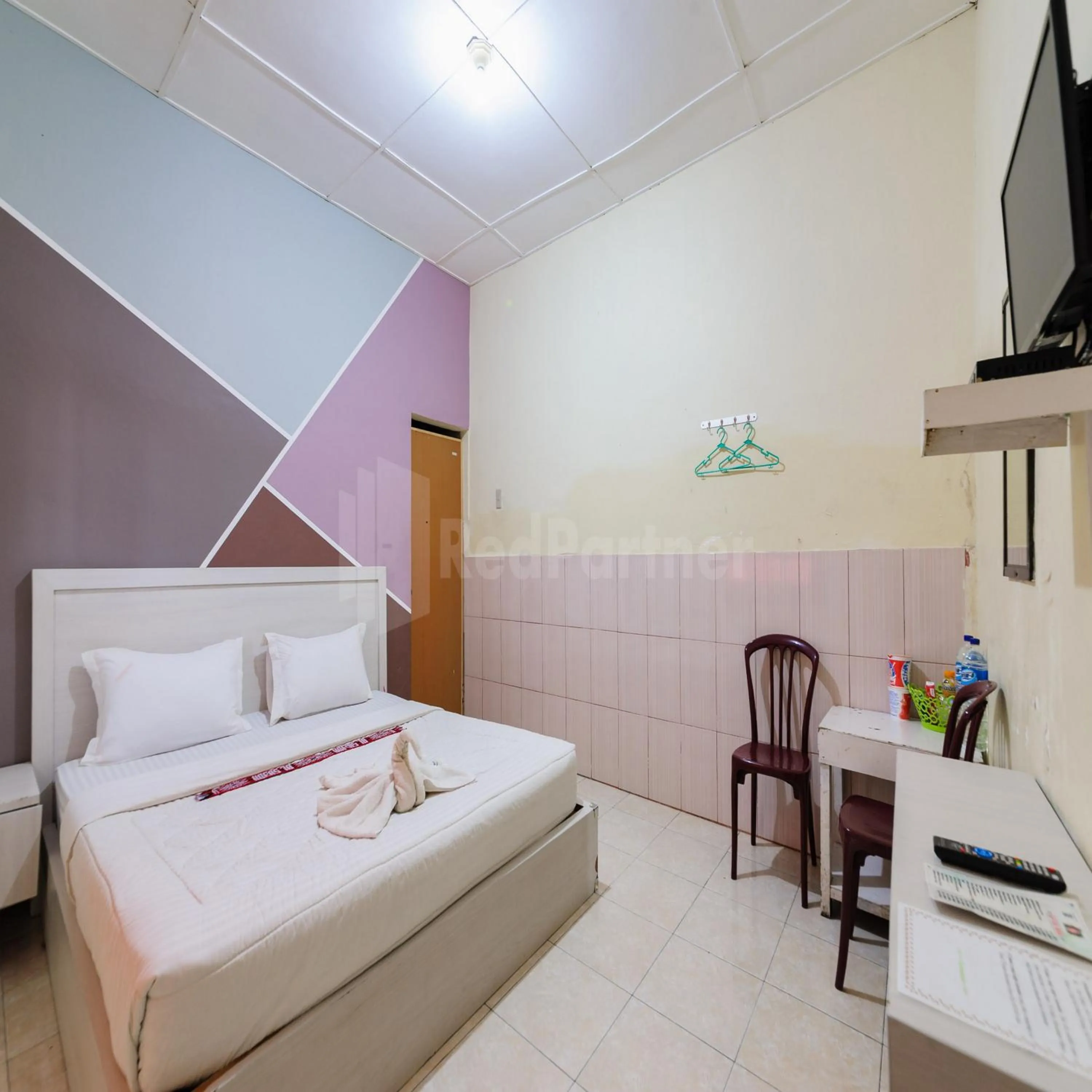 Bedroom, Bed in Hotel 78 Parapat Mitra RedDoorz