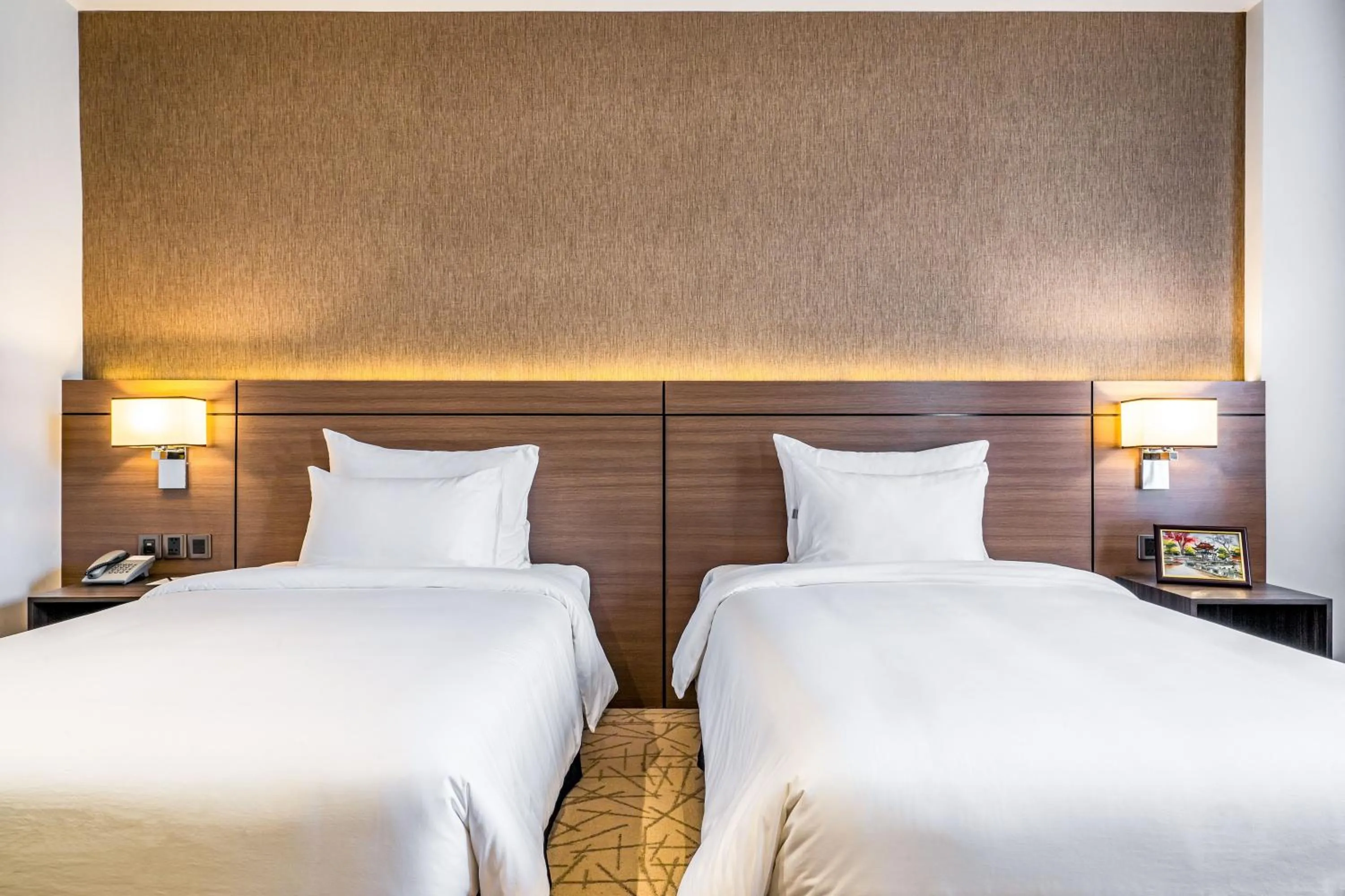 Bed in The Cap Hotel