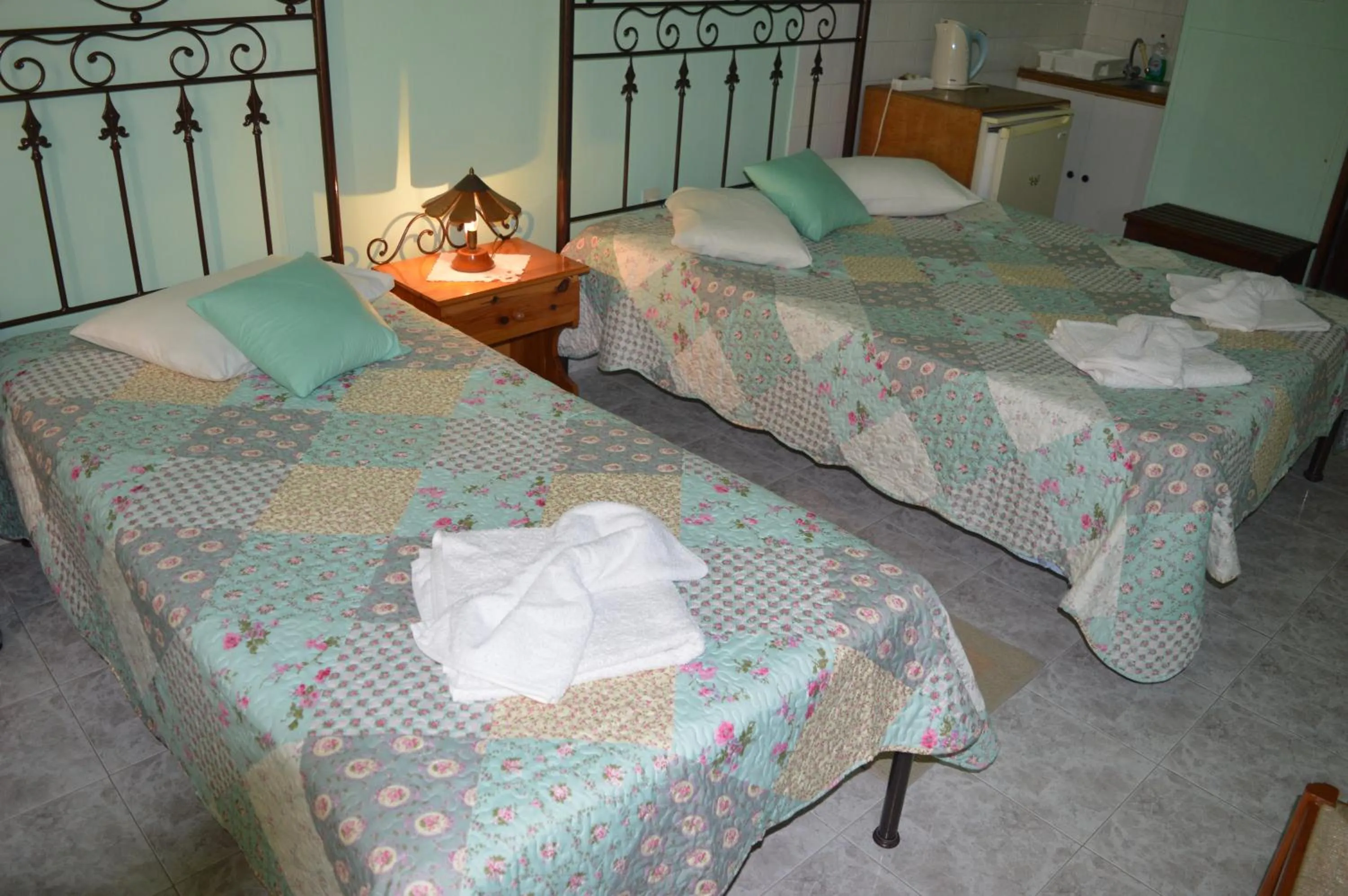 Bed in HERMOUPOLI ROOMS