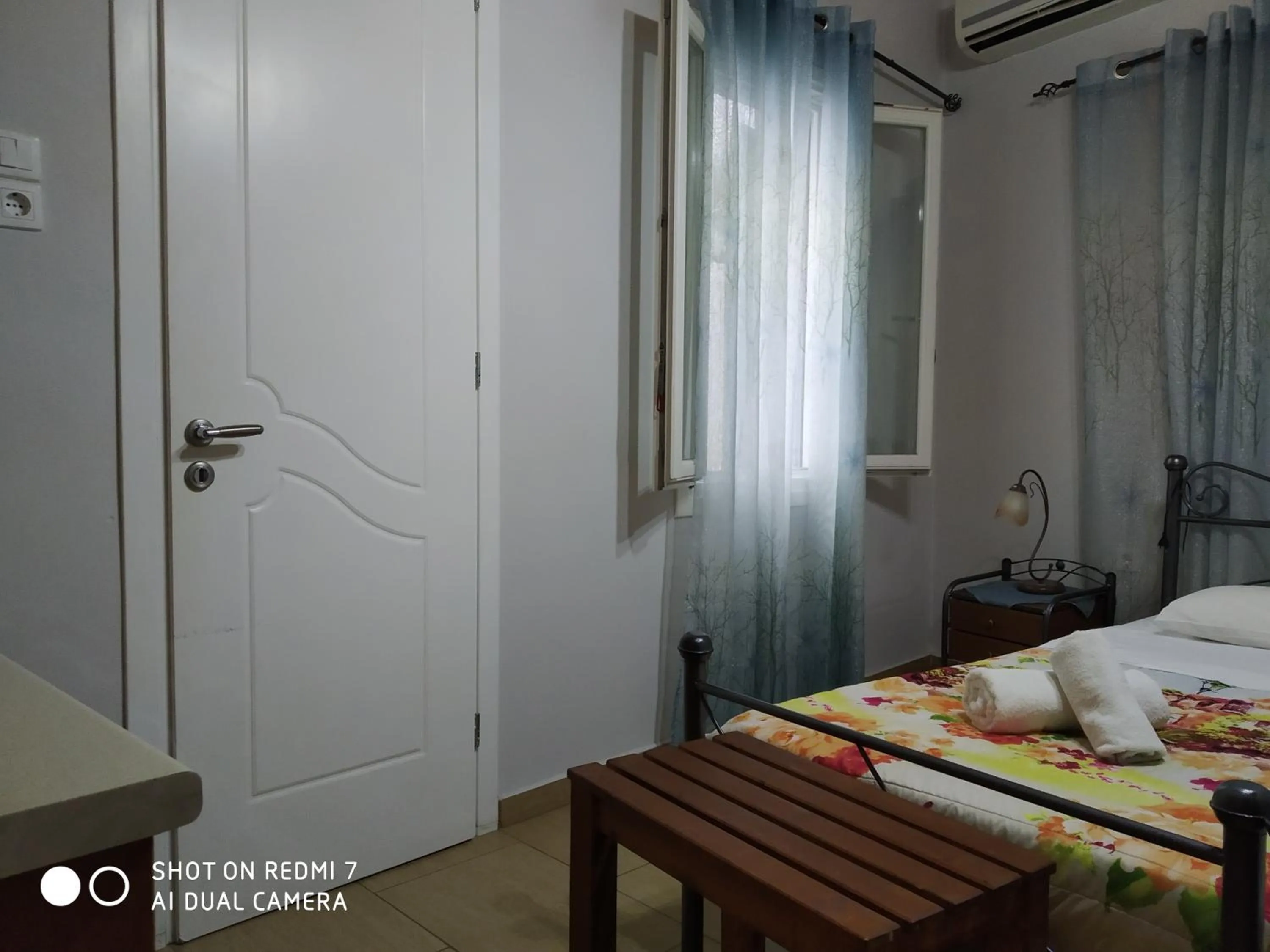 Bed in HERMOUPOLI ROOMS