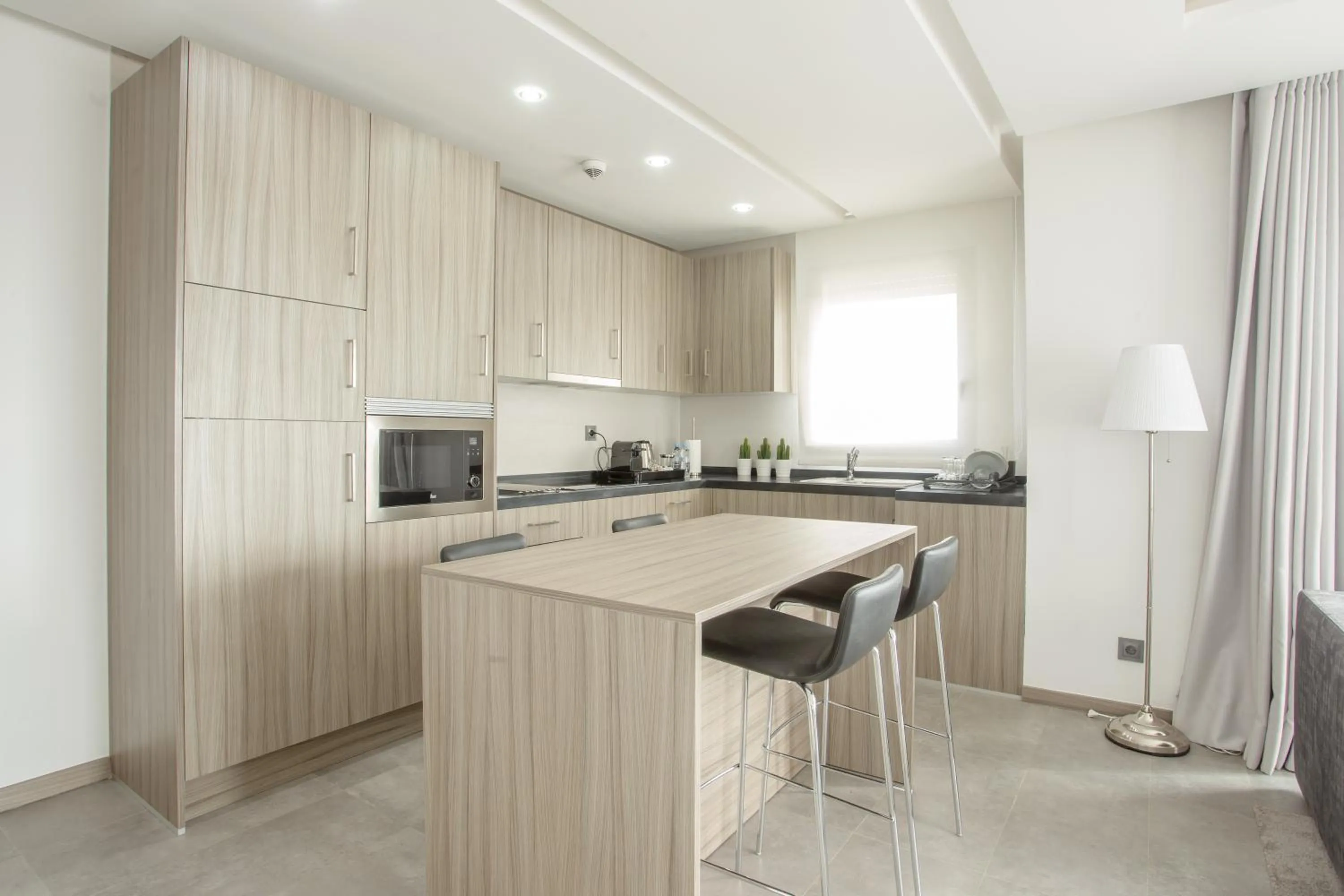 Kitchen or kitchenette in Makass Appart Hotel