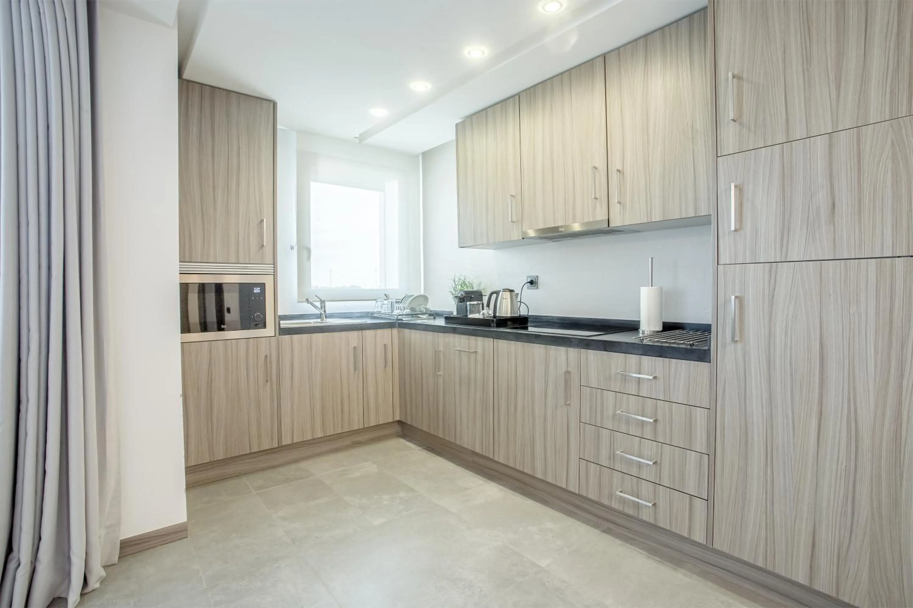 Kitchen or kitchenette in Makass Appart Hotel