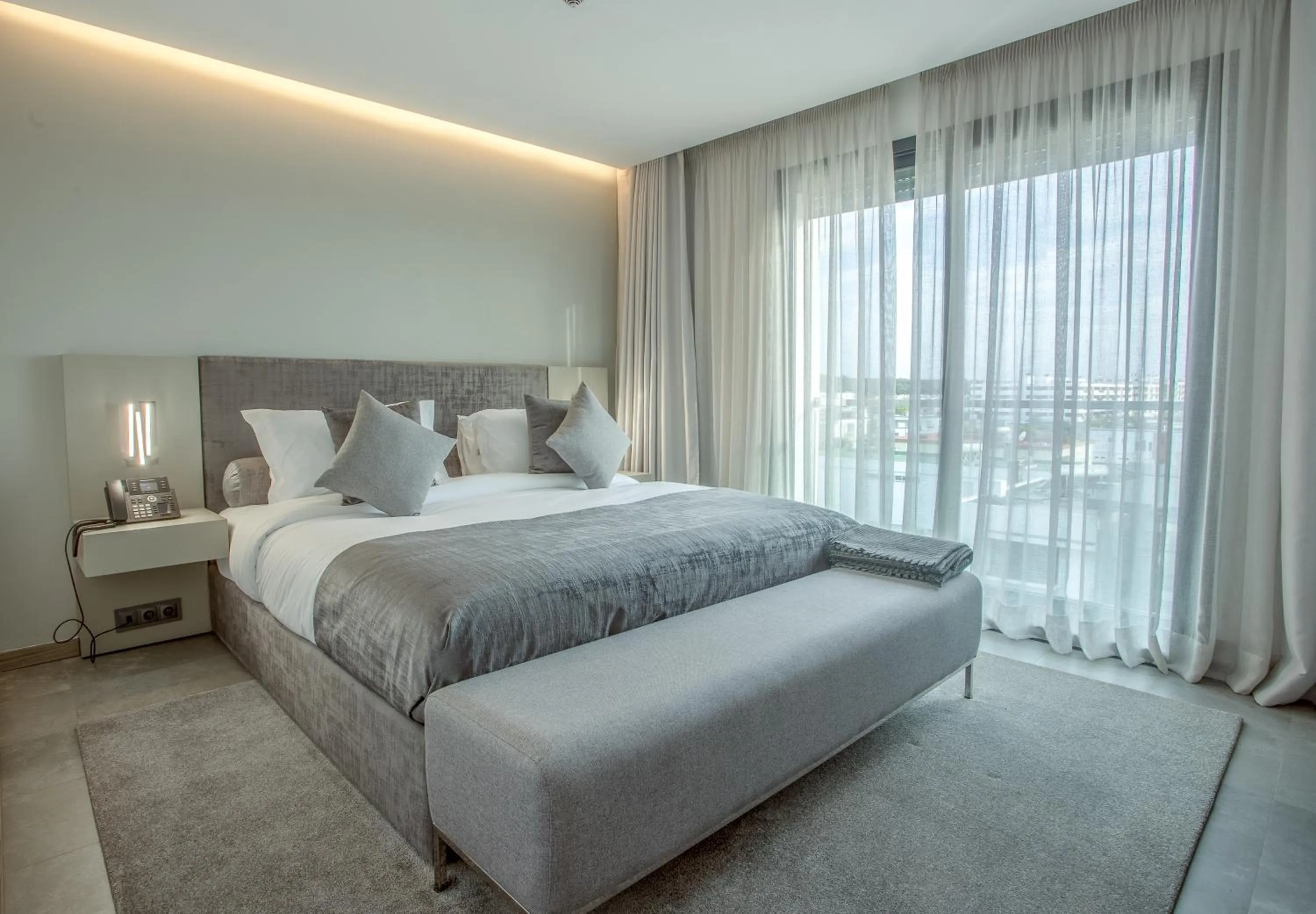 Bed in Makass Appart Hotel