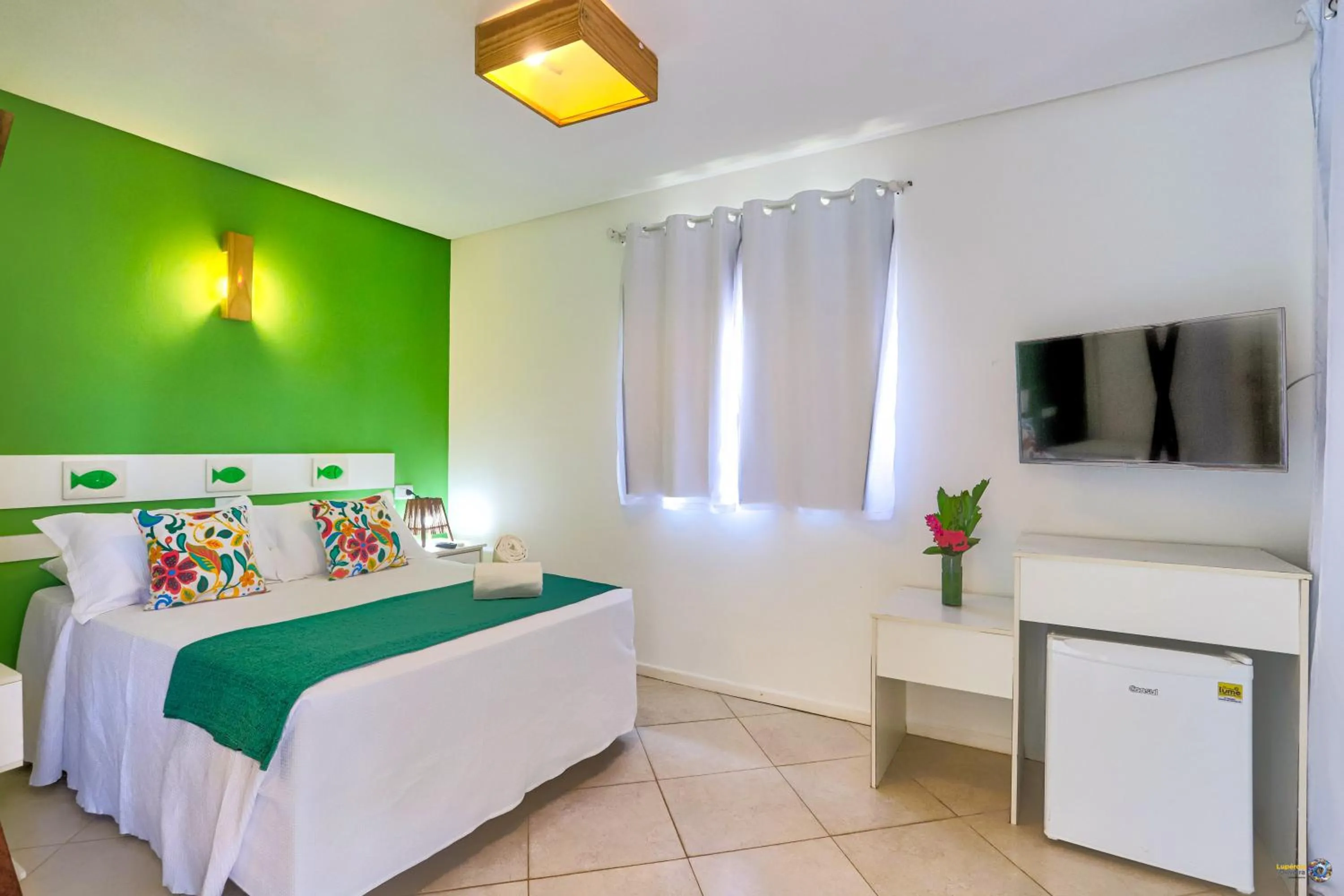 Photo of the whole room, Bed in Pousada Terra Mar Way