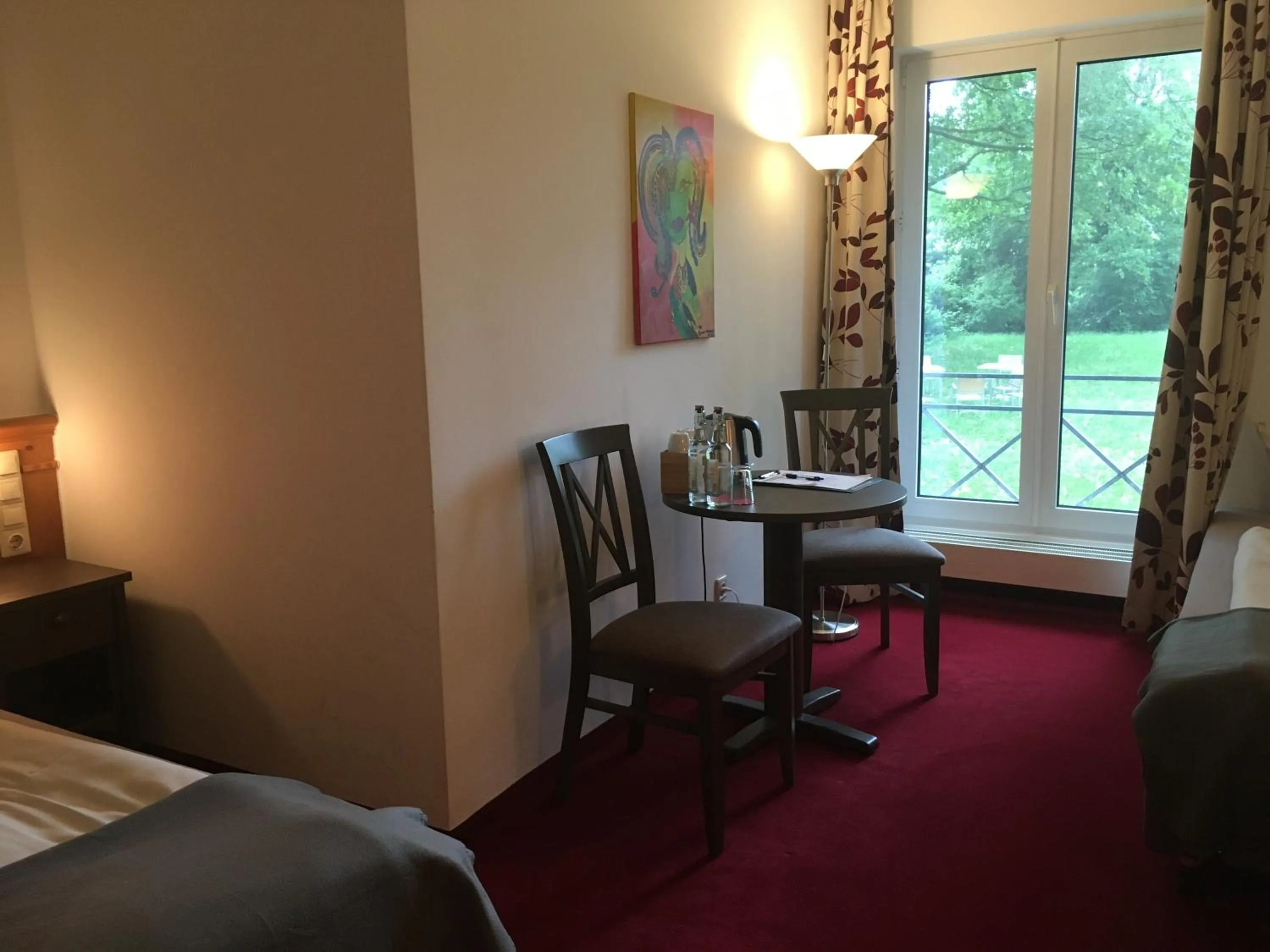 Seating area, Bed in Gästehaus Alte Schule