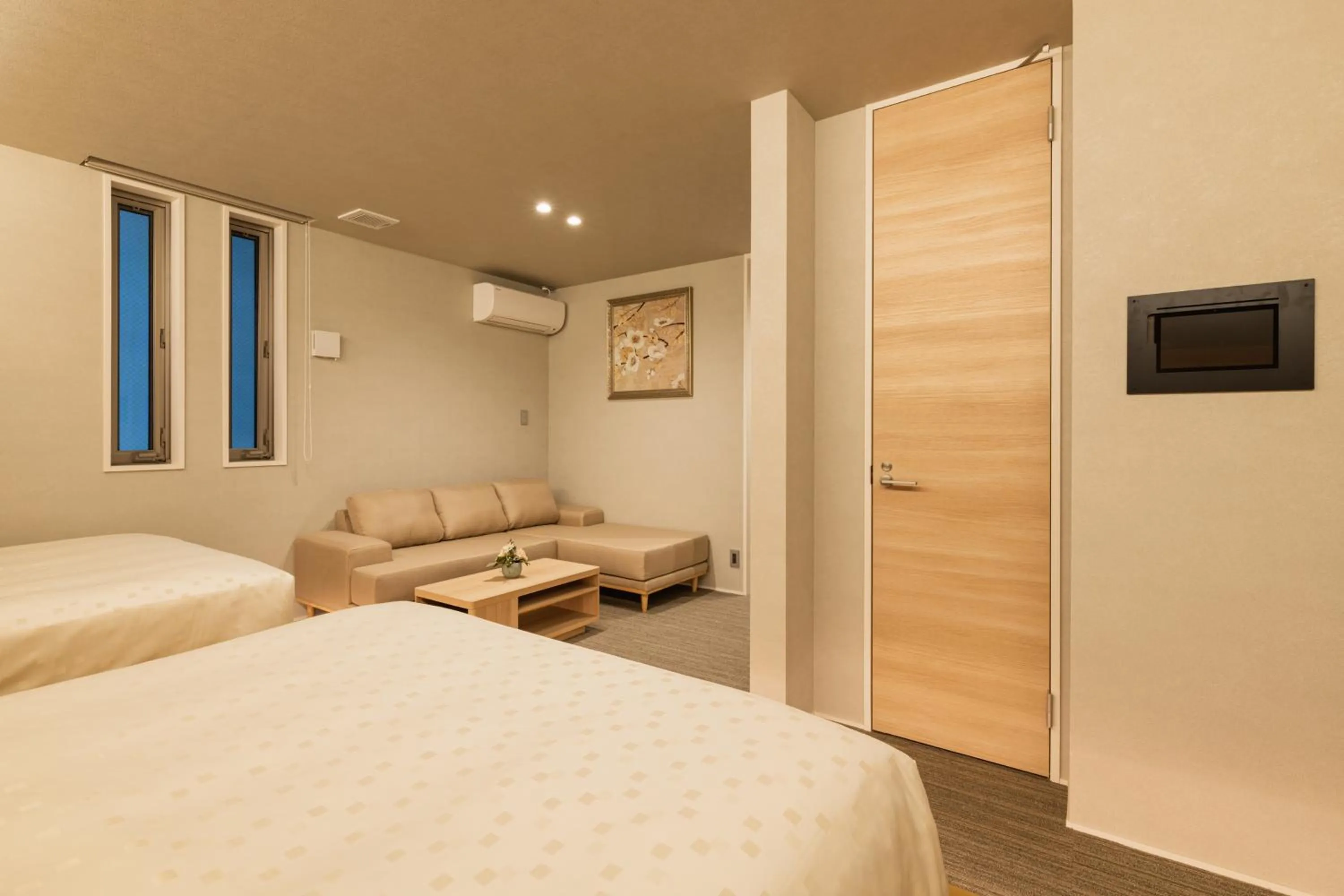 Photo of the whole room, Bed in GRAND BASE Hakata Station