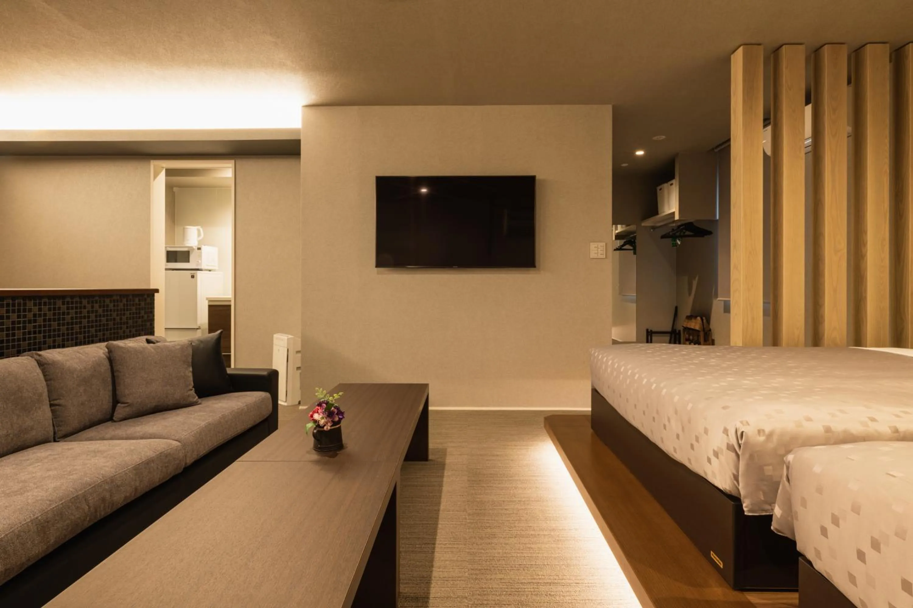 Seating area, Bed in GRAND BASE Hakata Station