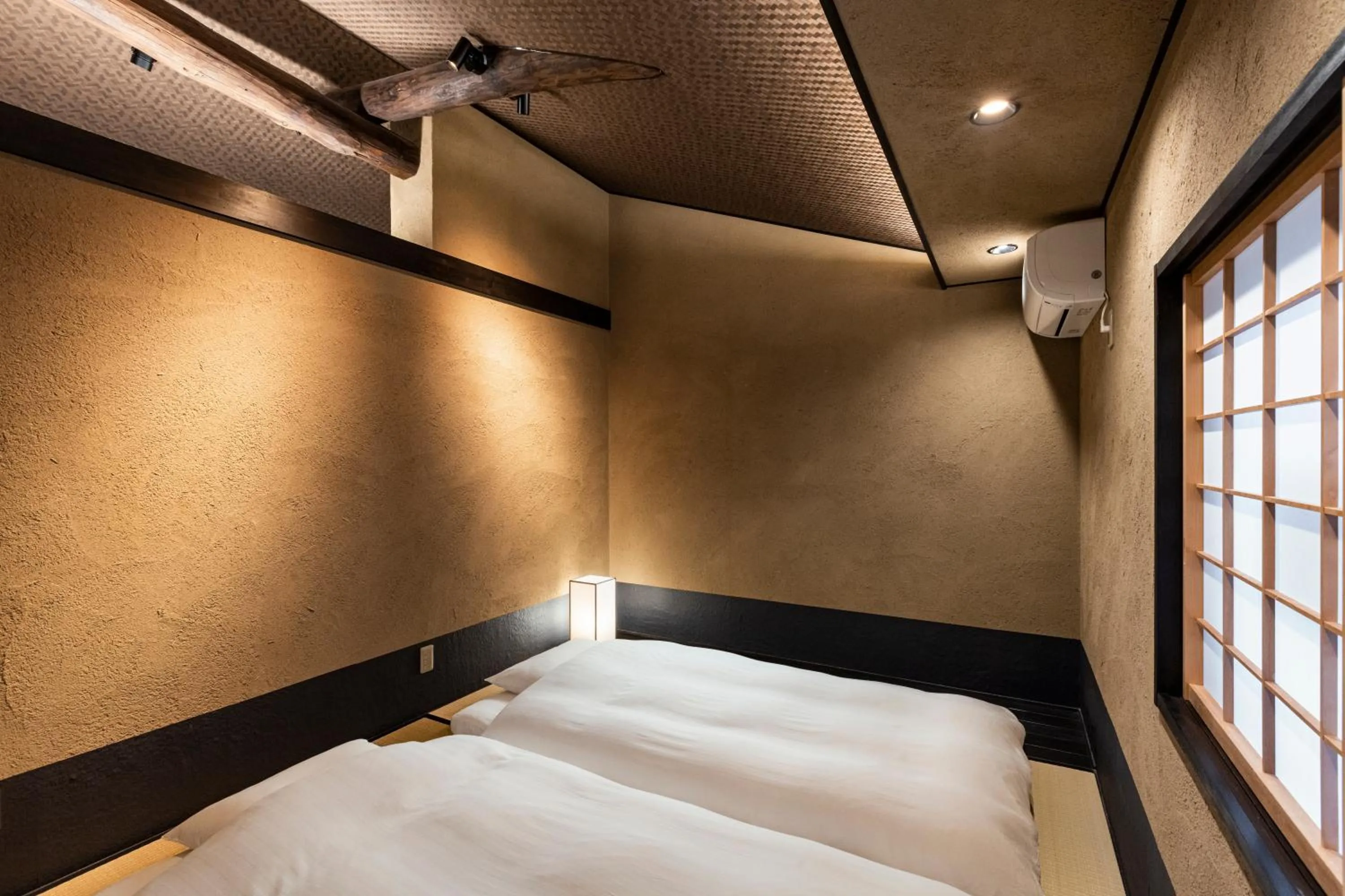 Photo of the whole room, Bed in Rinn Premium Hiun