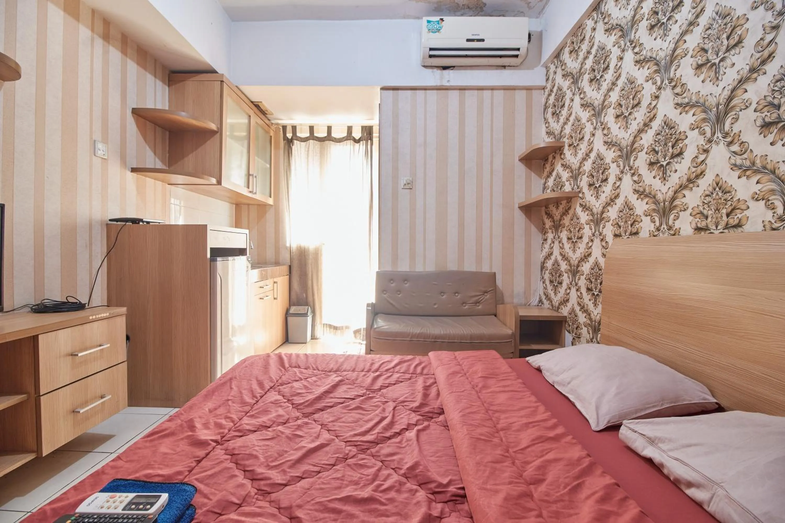 Bed in Apartment Green Lake View Ciputat by Celebrity Room