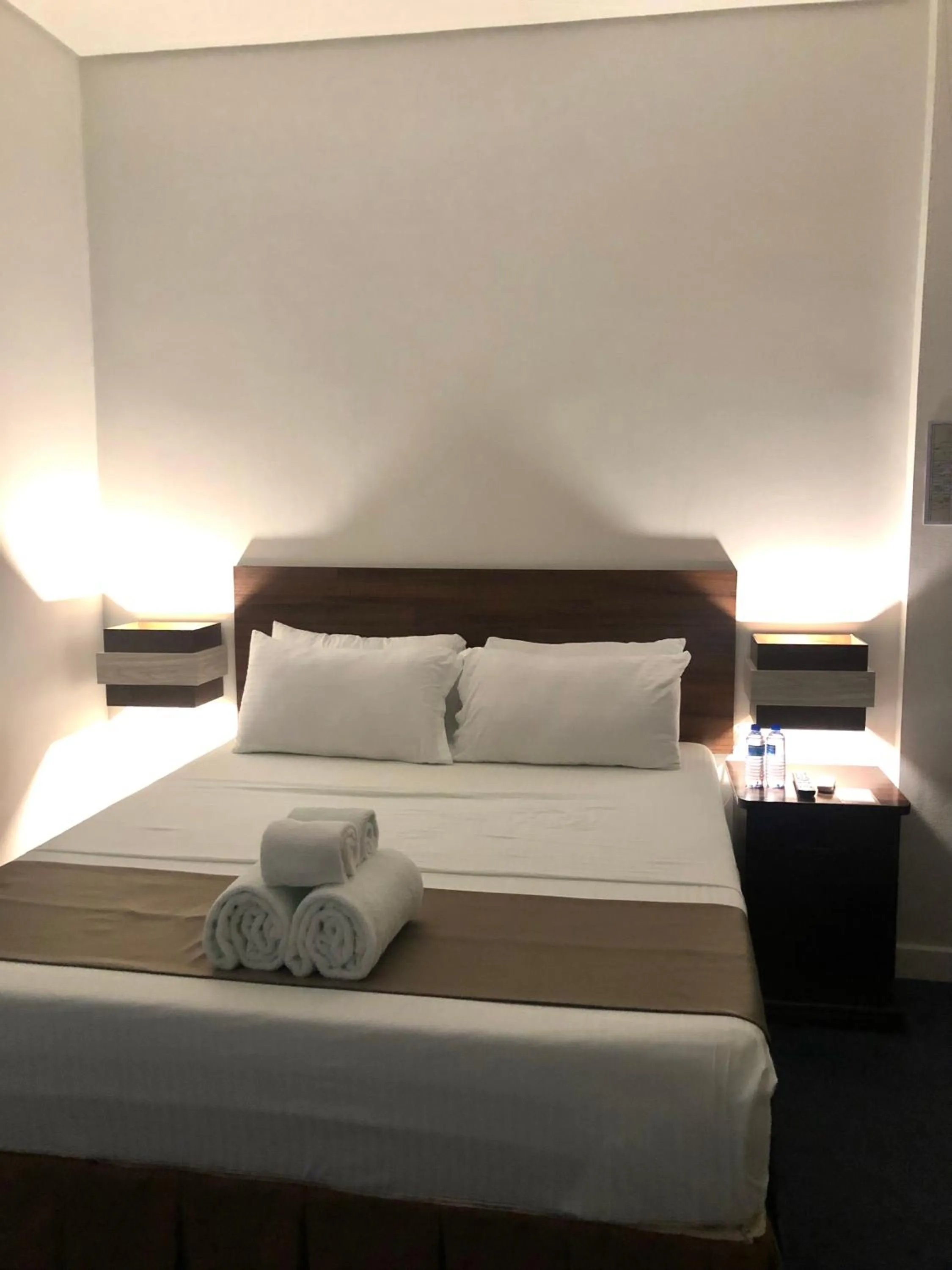 Bed in Seacliff Suites Hotel and Resort