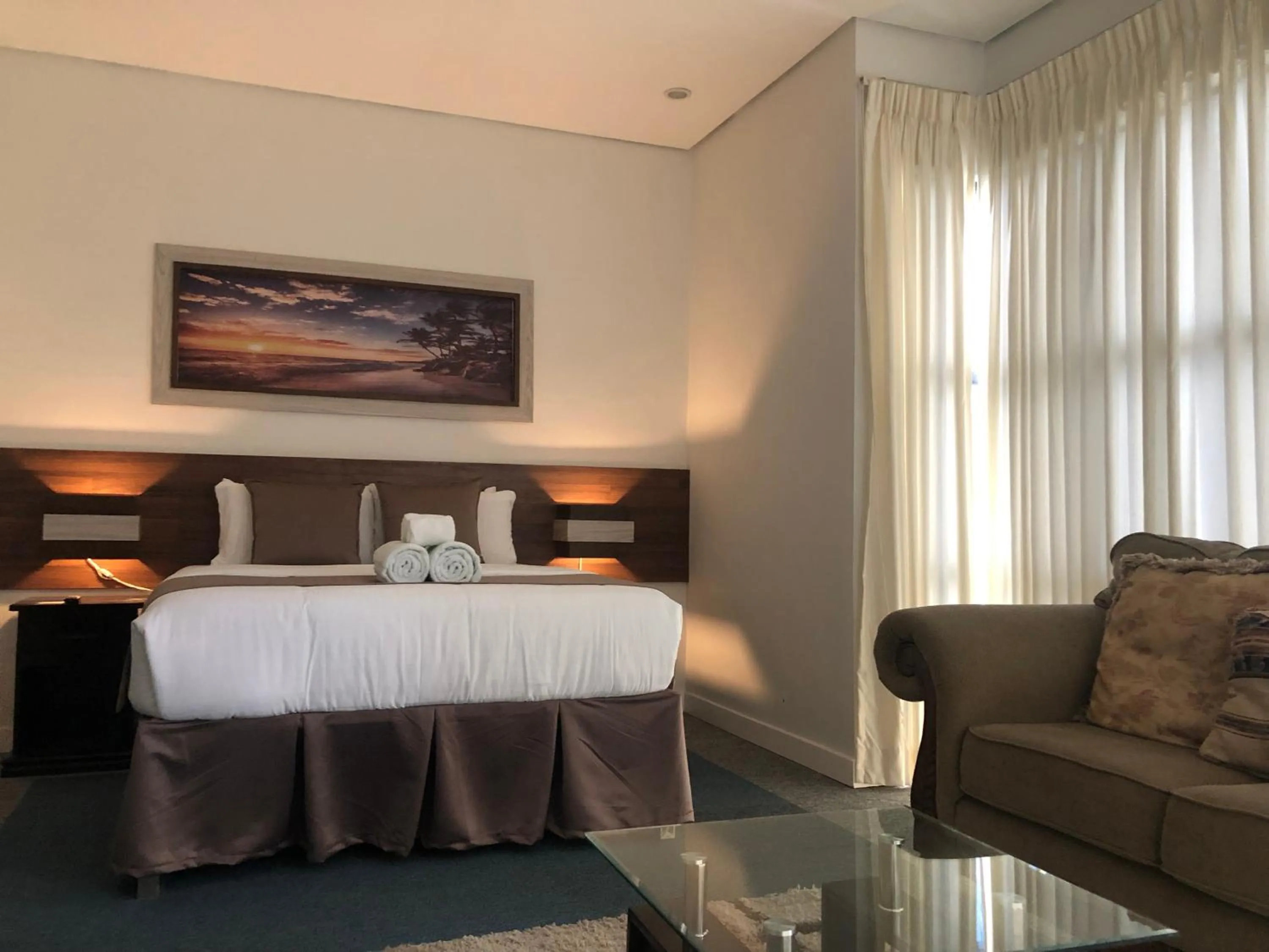 Bed in Seacliff Suites Hotel and Resort