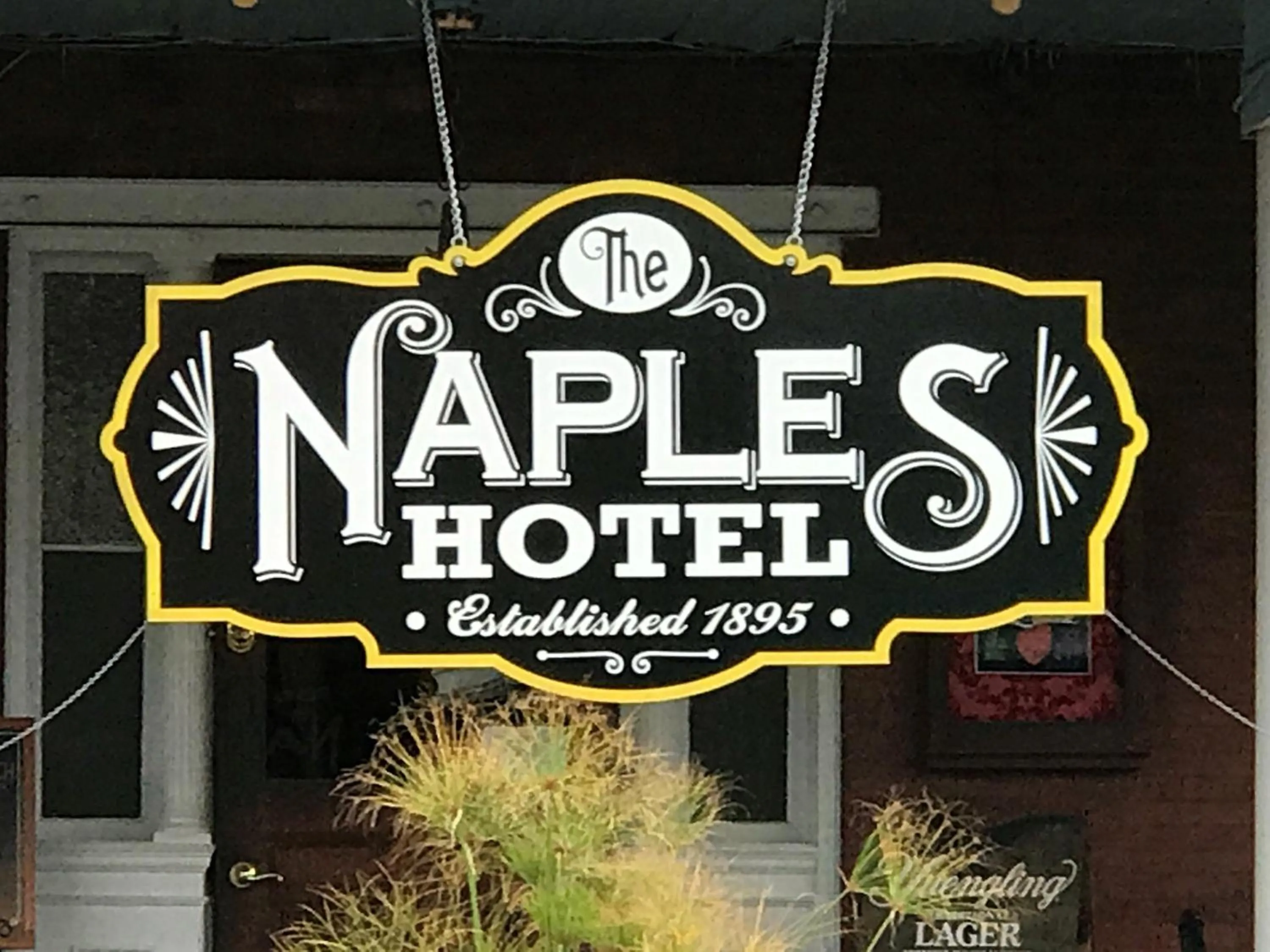 Property logo or sign in Naples Hotel