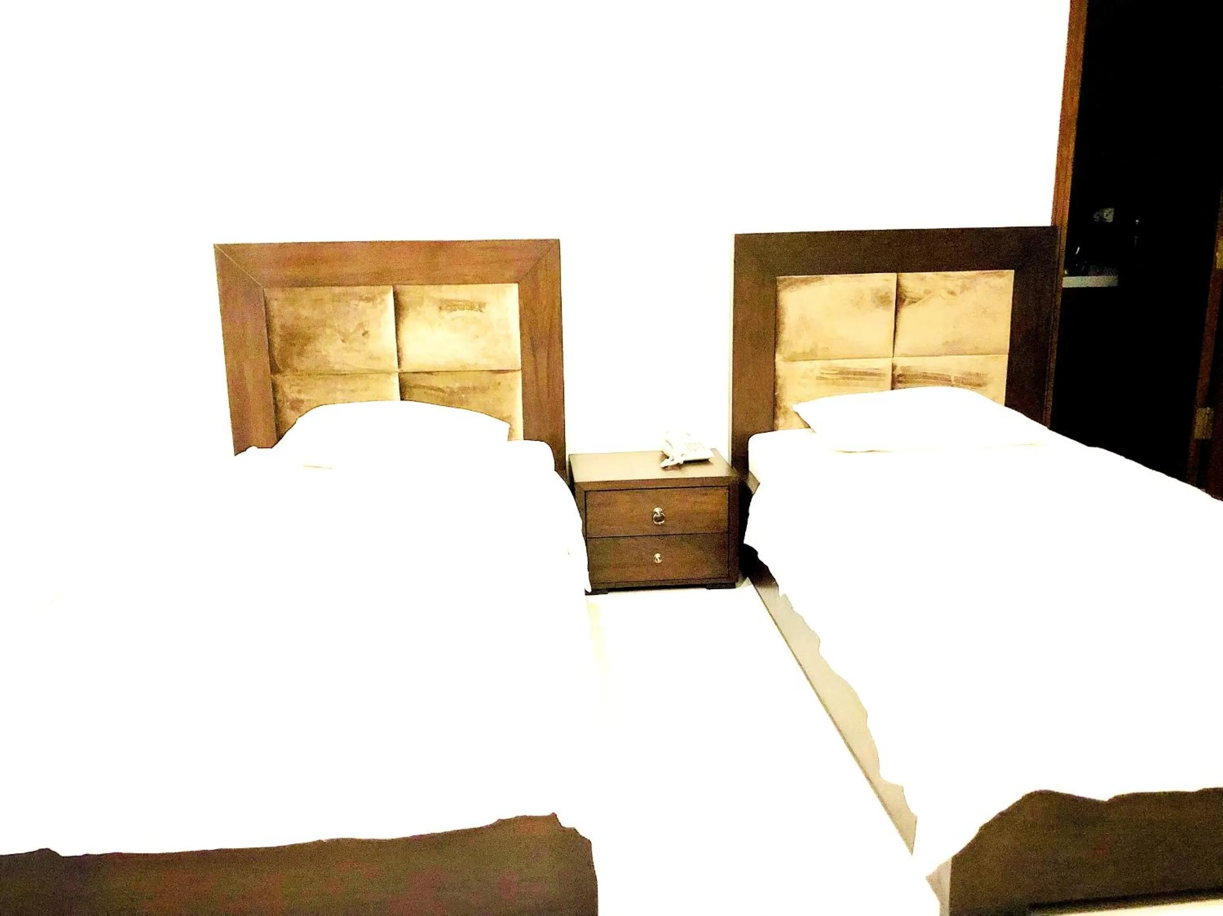 Bedroom, Bed in Jade Dragon Hotel DHA Lahore