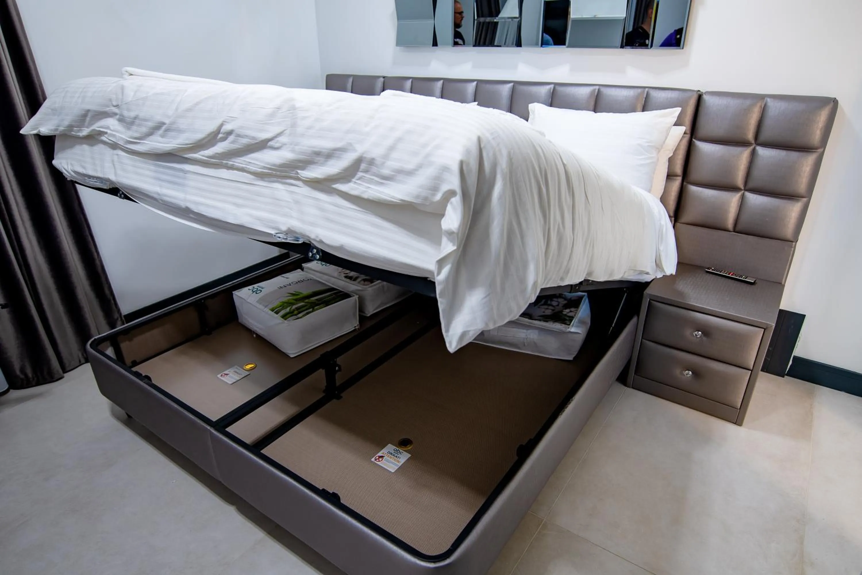 Bed in Enjoy Life Apartments