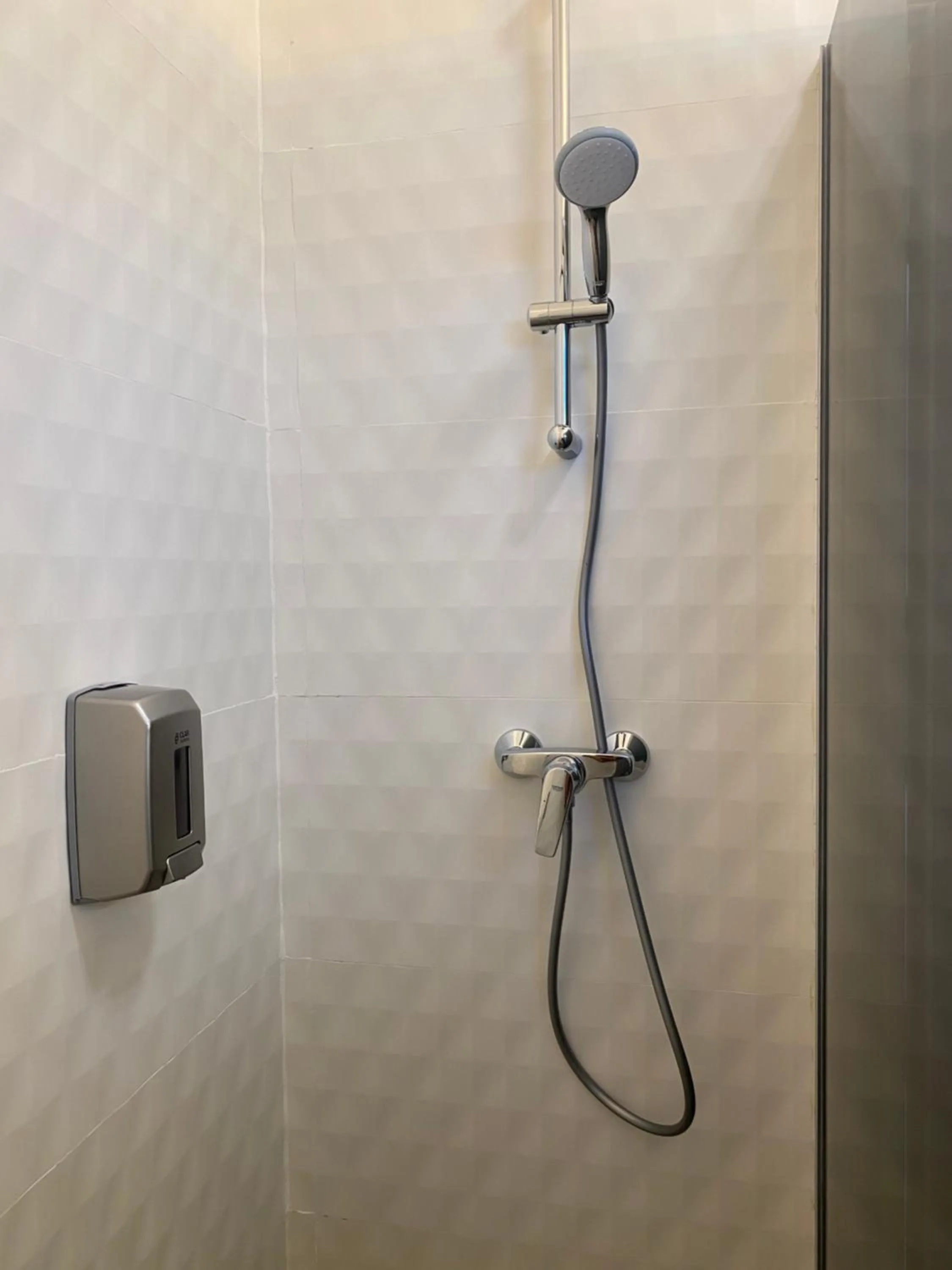 Shower in Enjoy Life Apartments