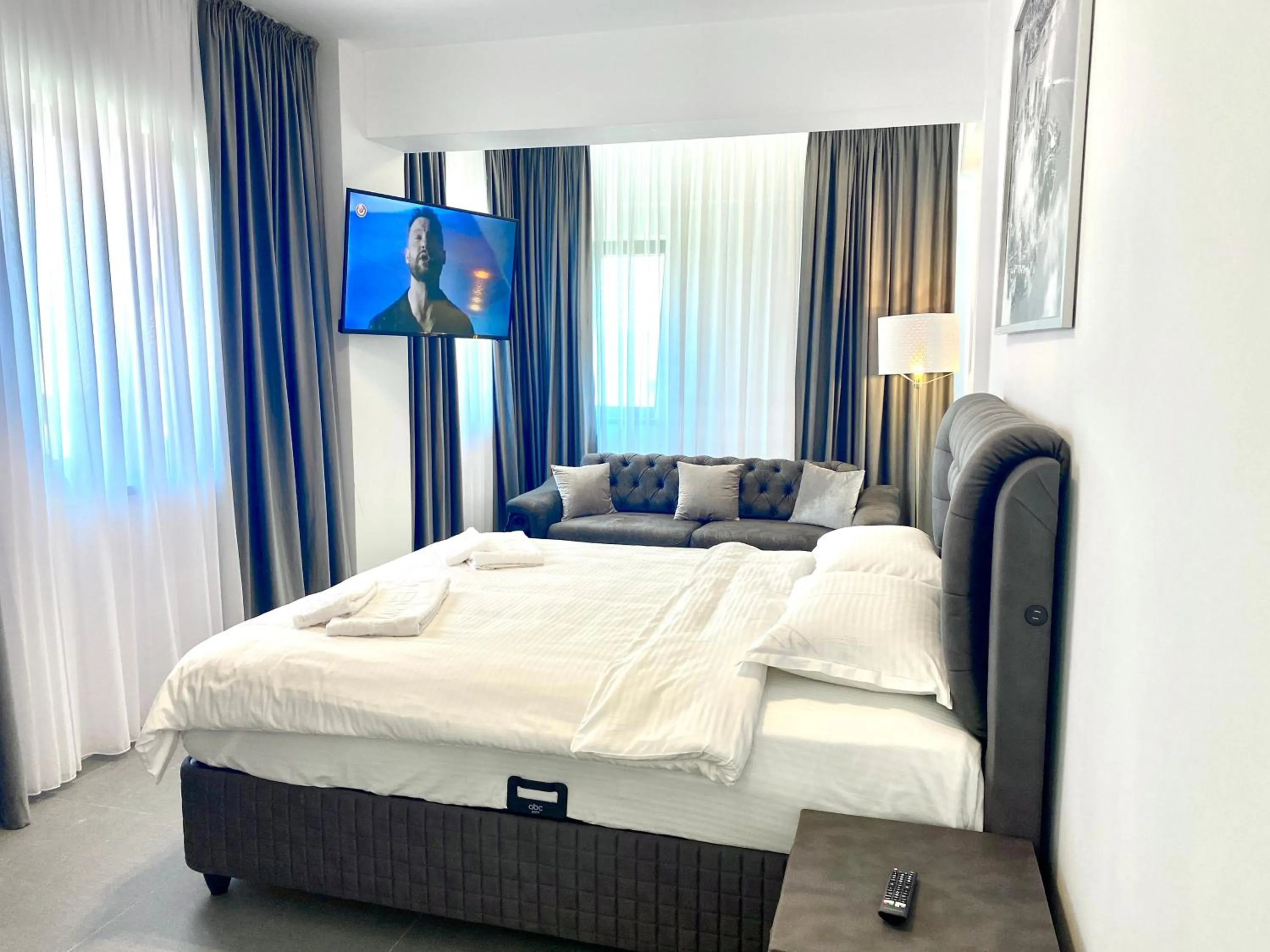 Bed in Enjoy Life Apartments