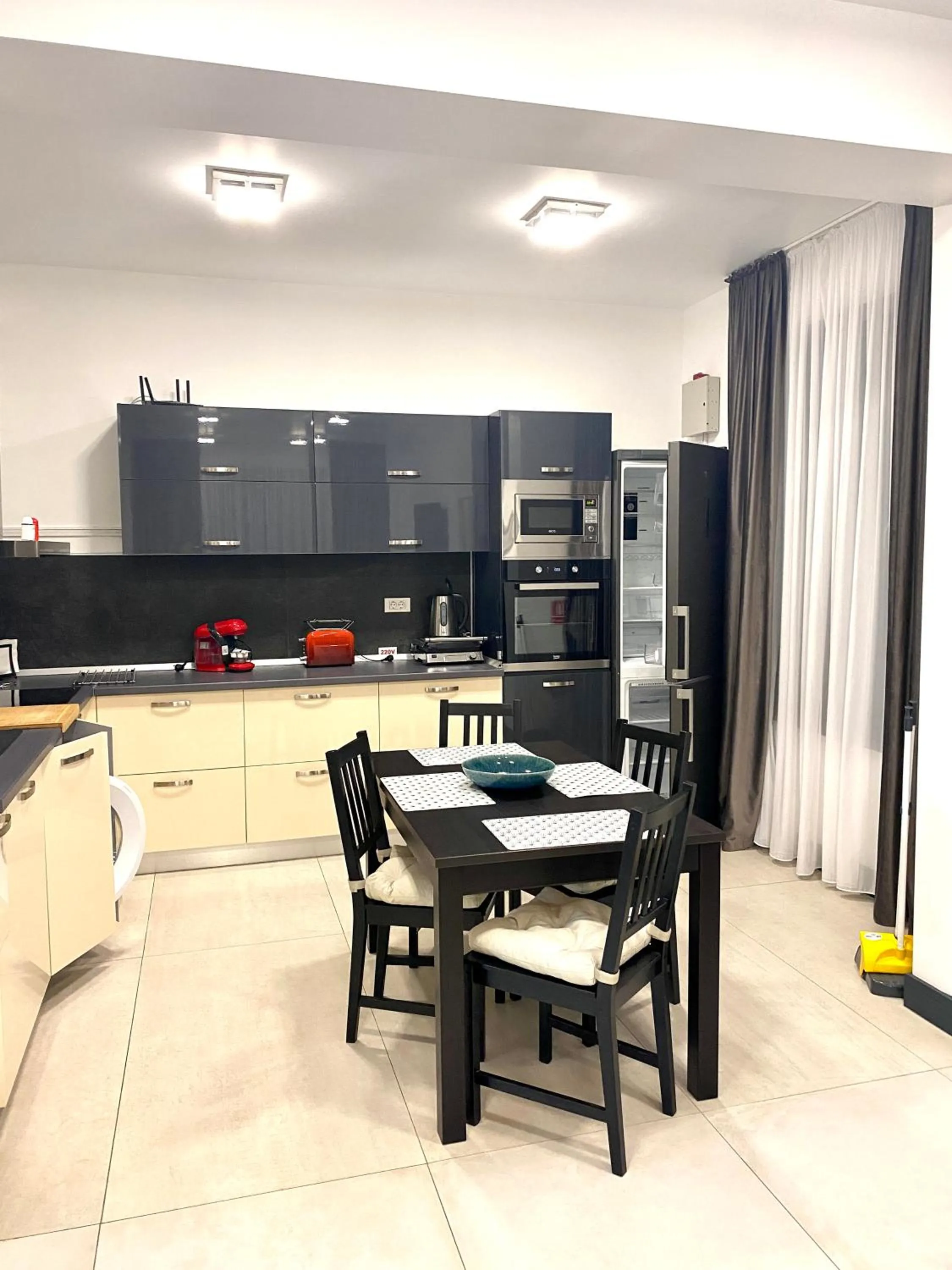 Kitchen or kitchenette in Enjoy Life Apartments