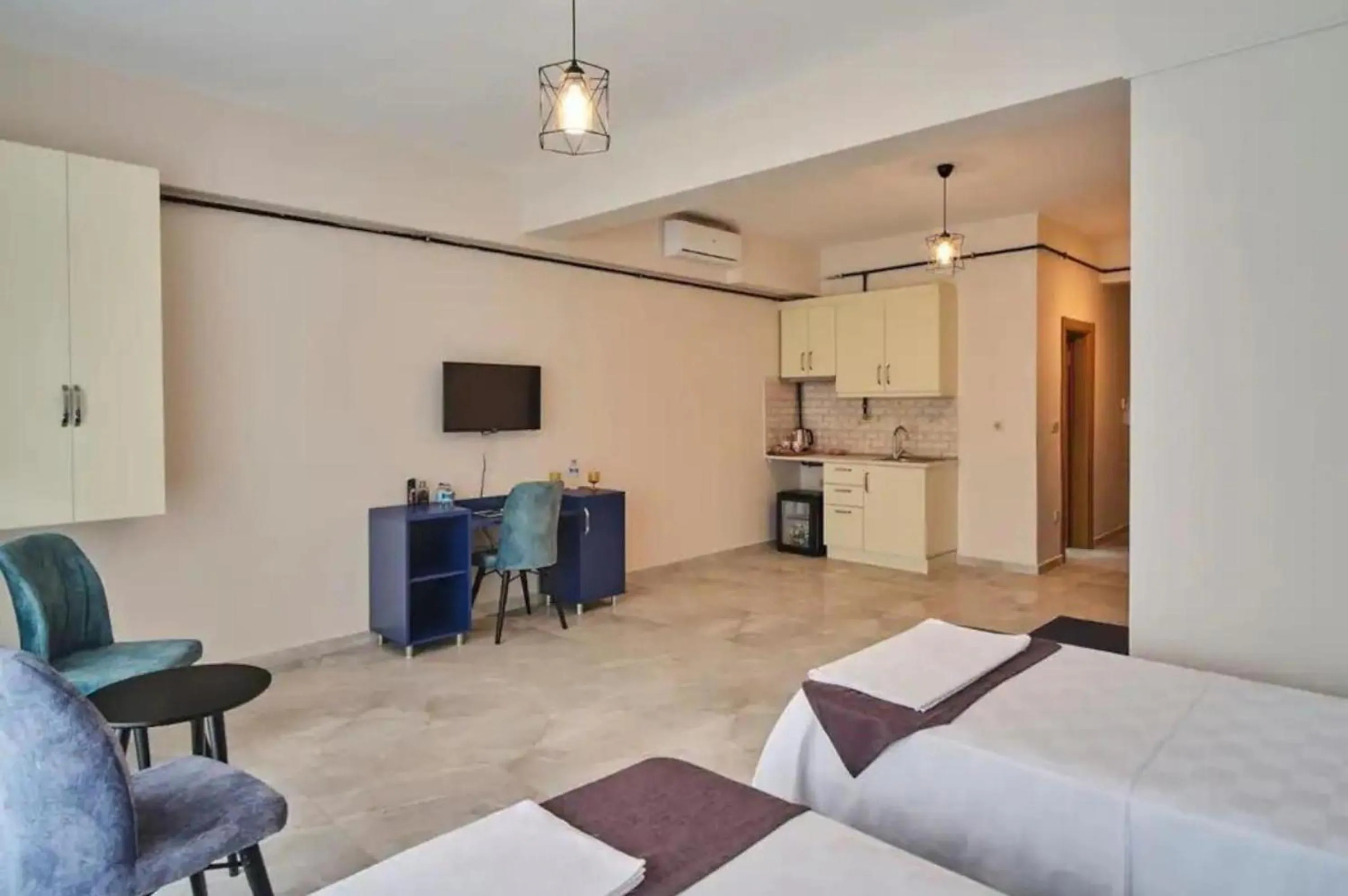 Bed in Mini Suite Otel