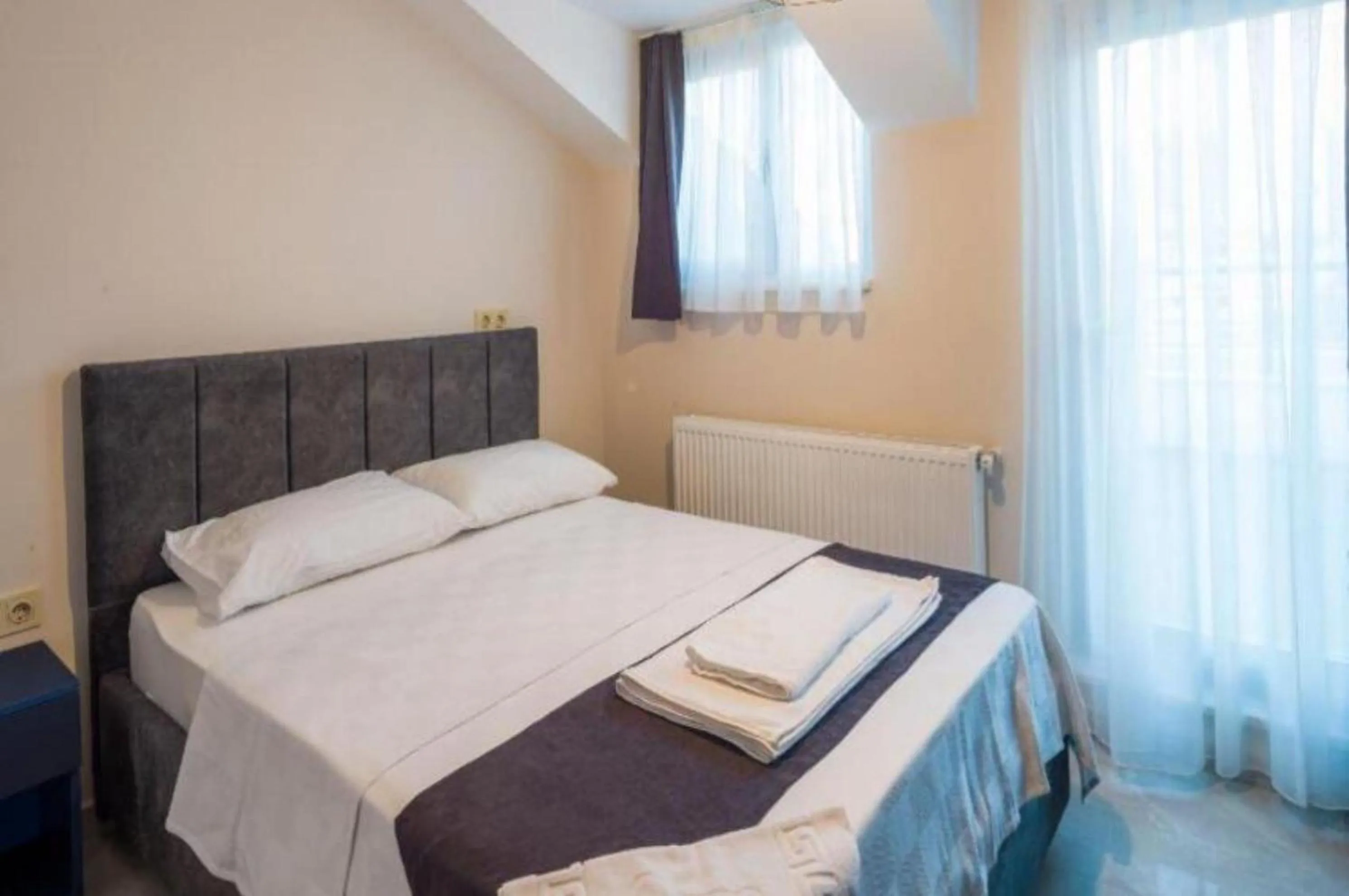 Bed in Mini Suite Otel