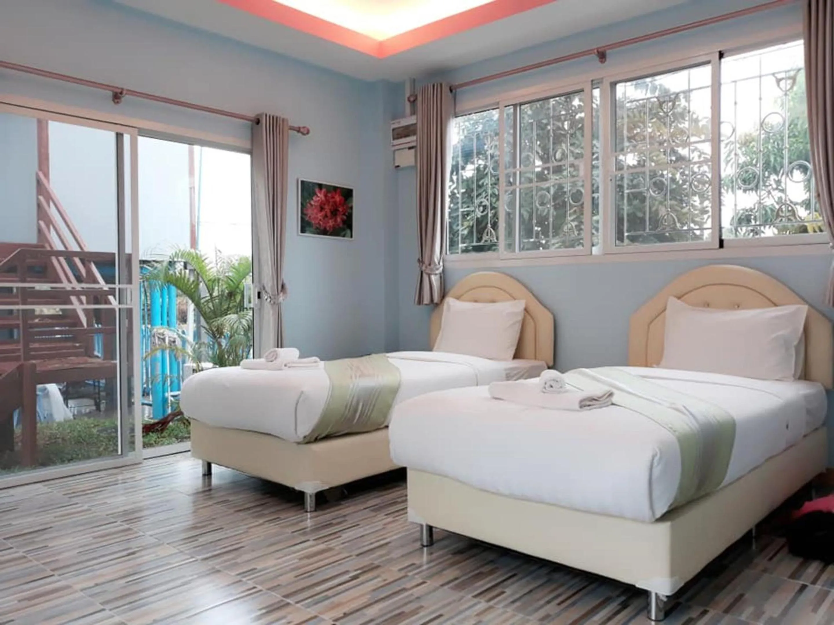 Photo of the whole room, Bed in AP Grand Resort