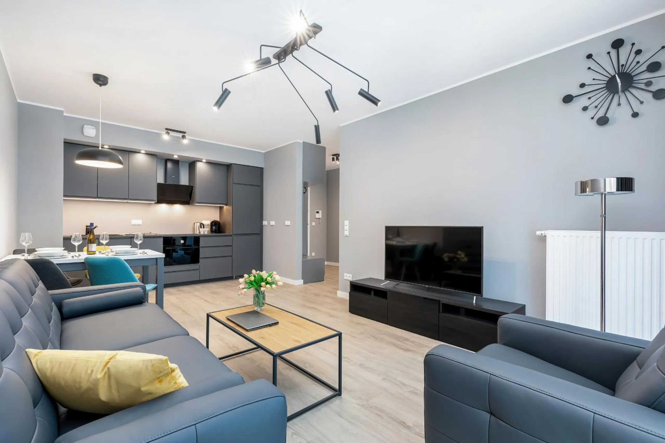 Living room in Modern City Center Apartments by Noclegi Renters