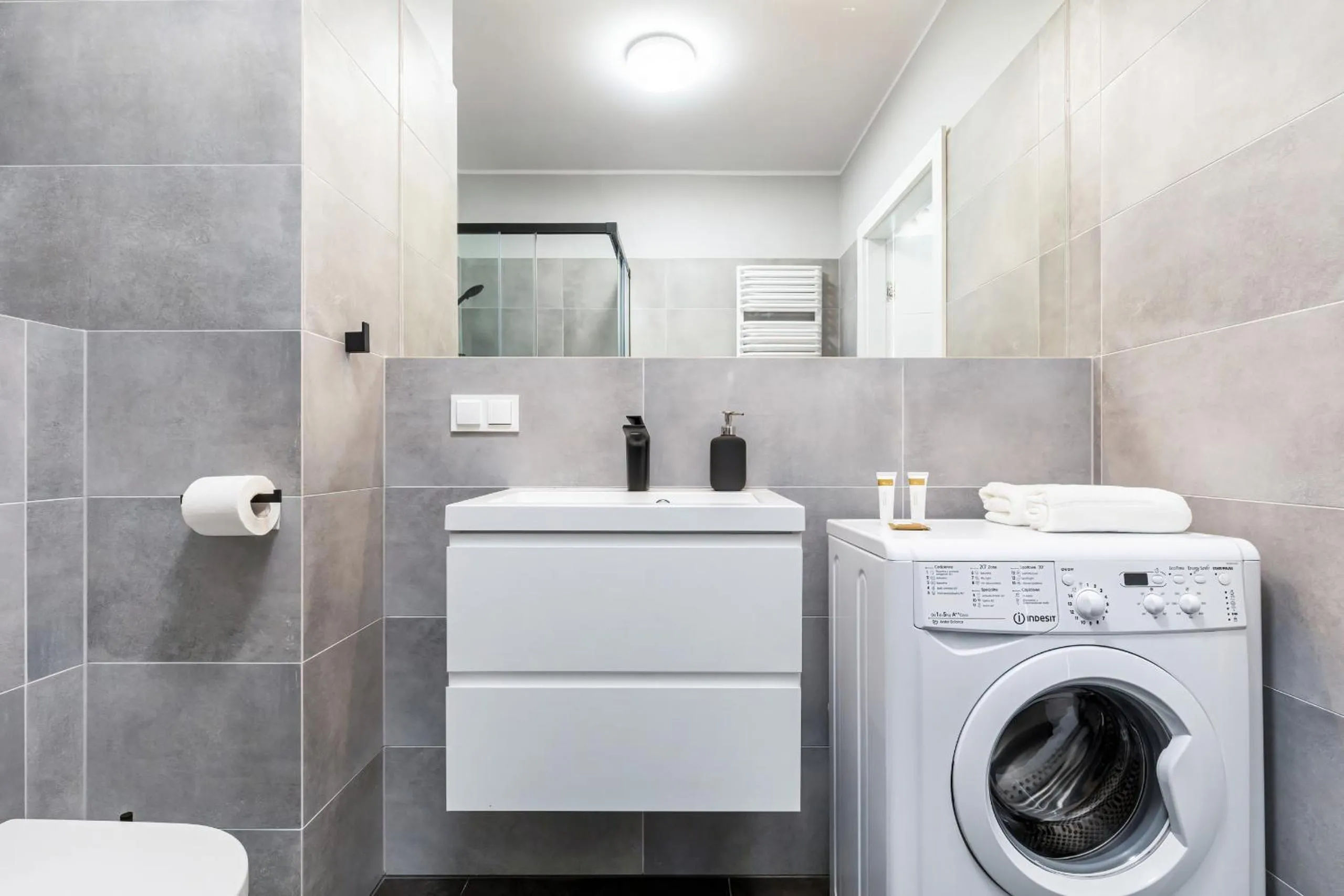 Bathroom in Modern City Center Apartments by Noclegi Renters