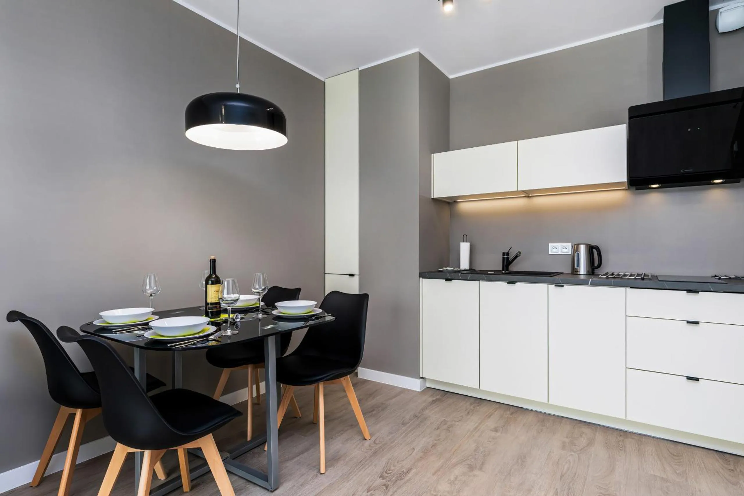 Kitchen or kitchenette in Modern City Center Apartments by Noclegi Renters