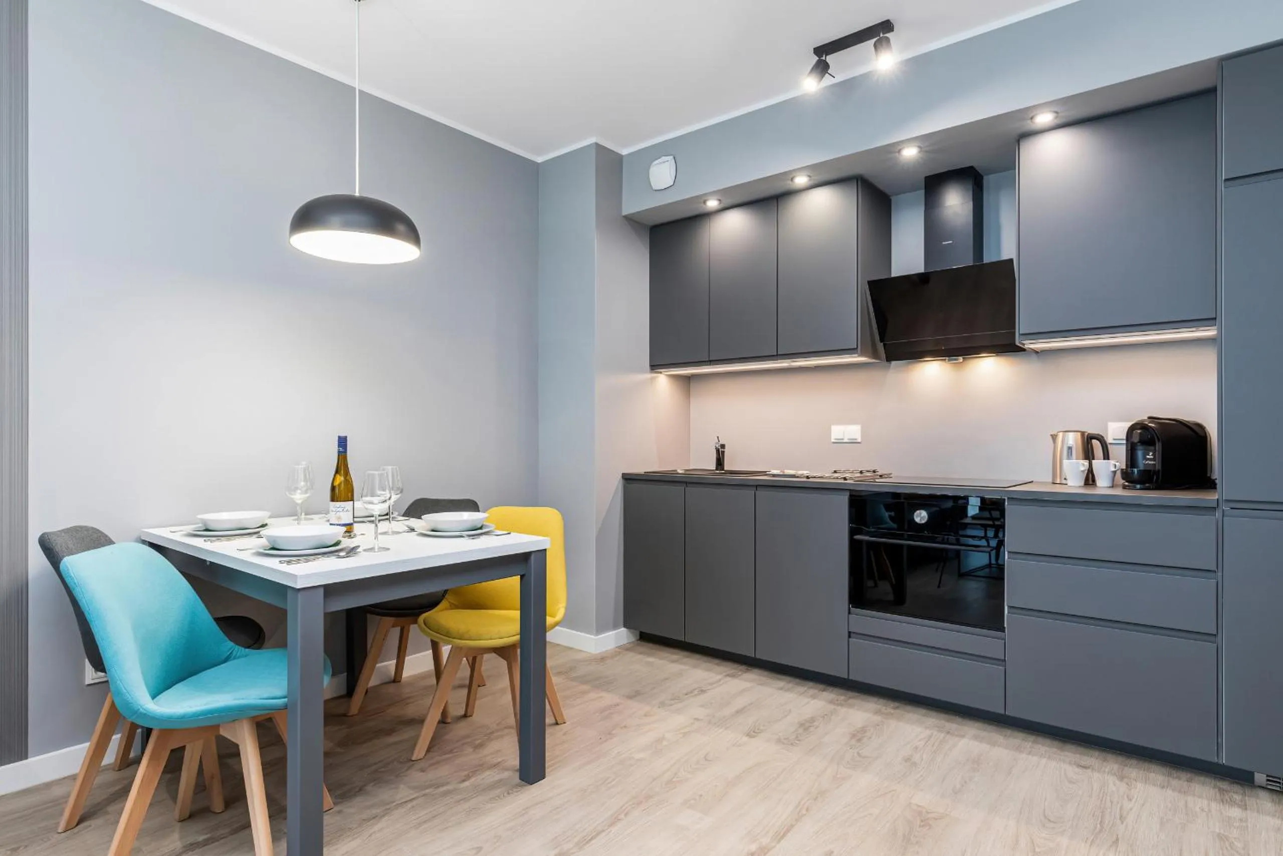 Kitchen or kitchenette in Modern City Center Apartments by Noclegi Renters