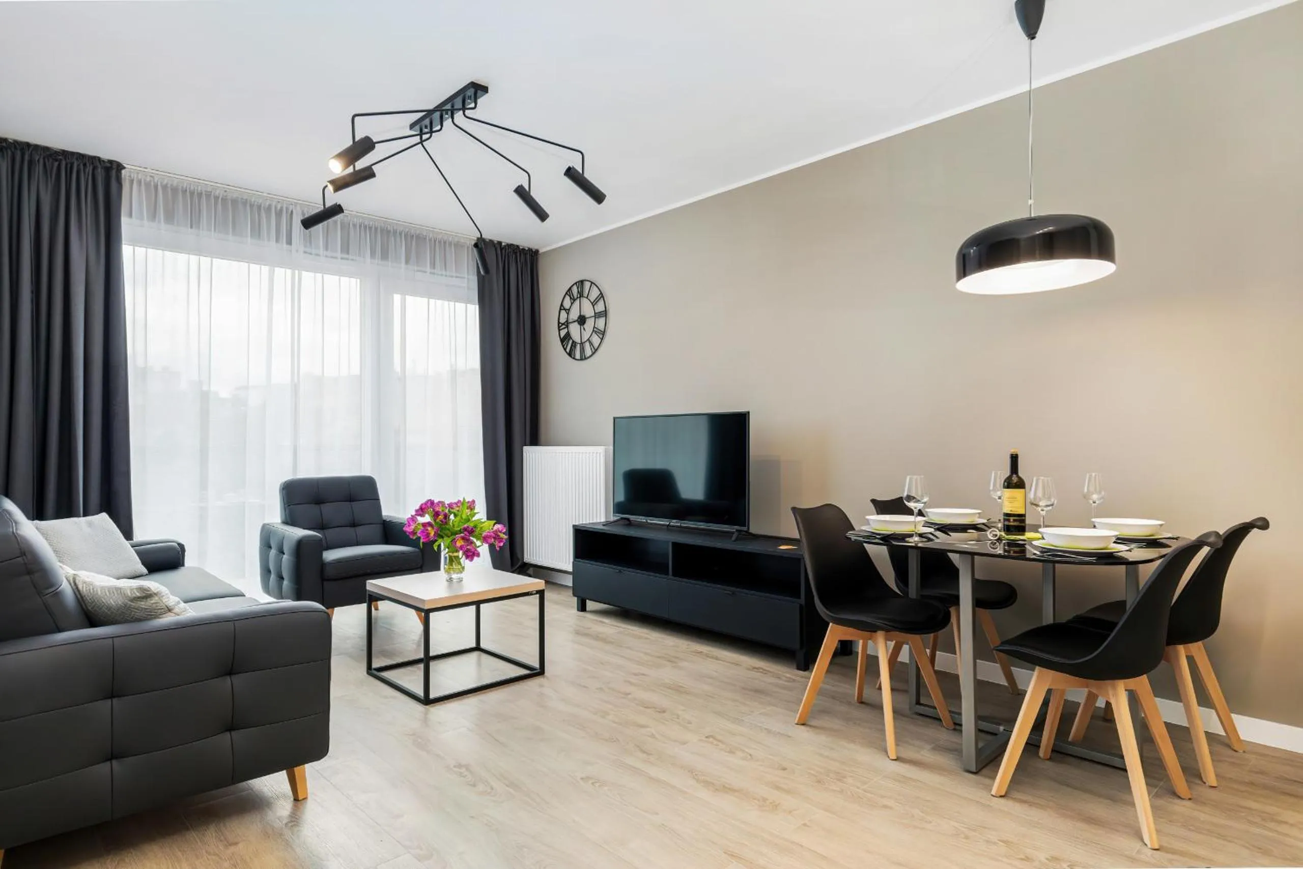 Living room in Modern City Center Apartments by Noclegi Renters