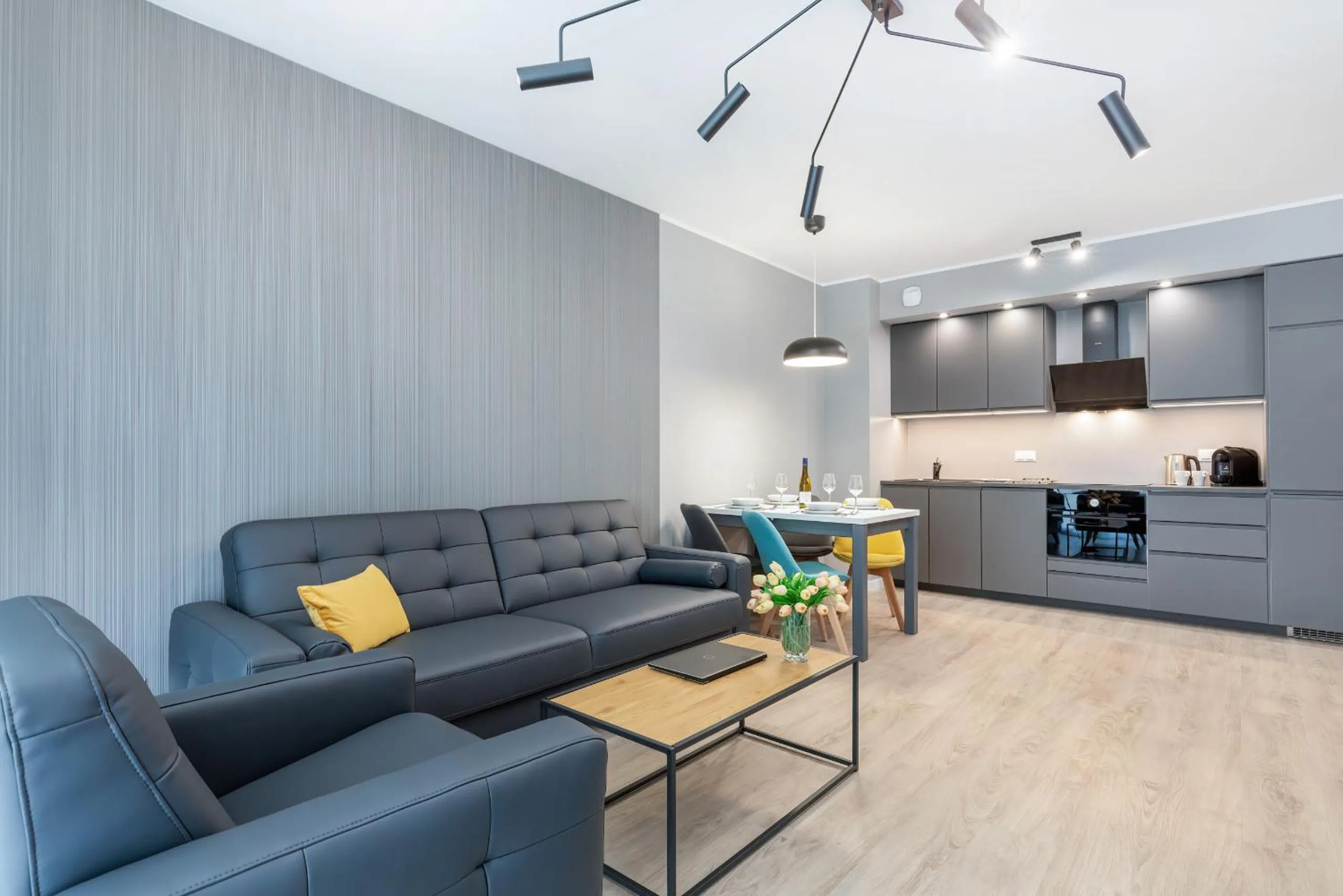 Living room in Modern City Center Apartments by Noclegi Renters