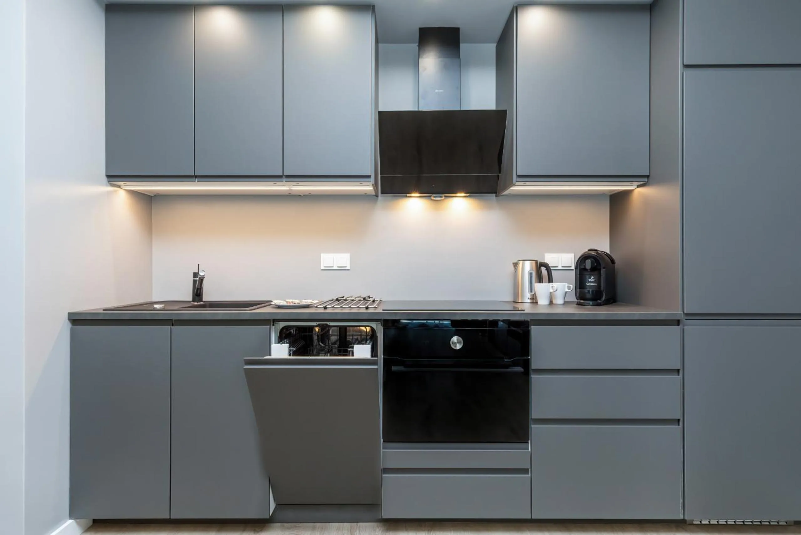 Kitchen or kitchenette in Modern City Center Apartments by Noclegi Renters
