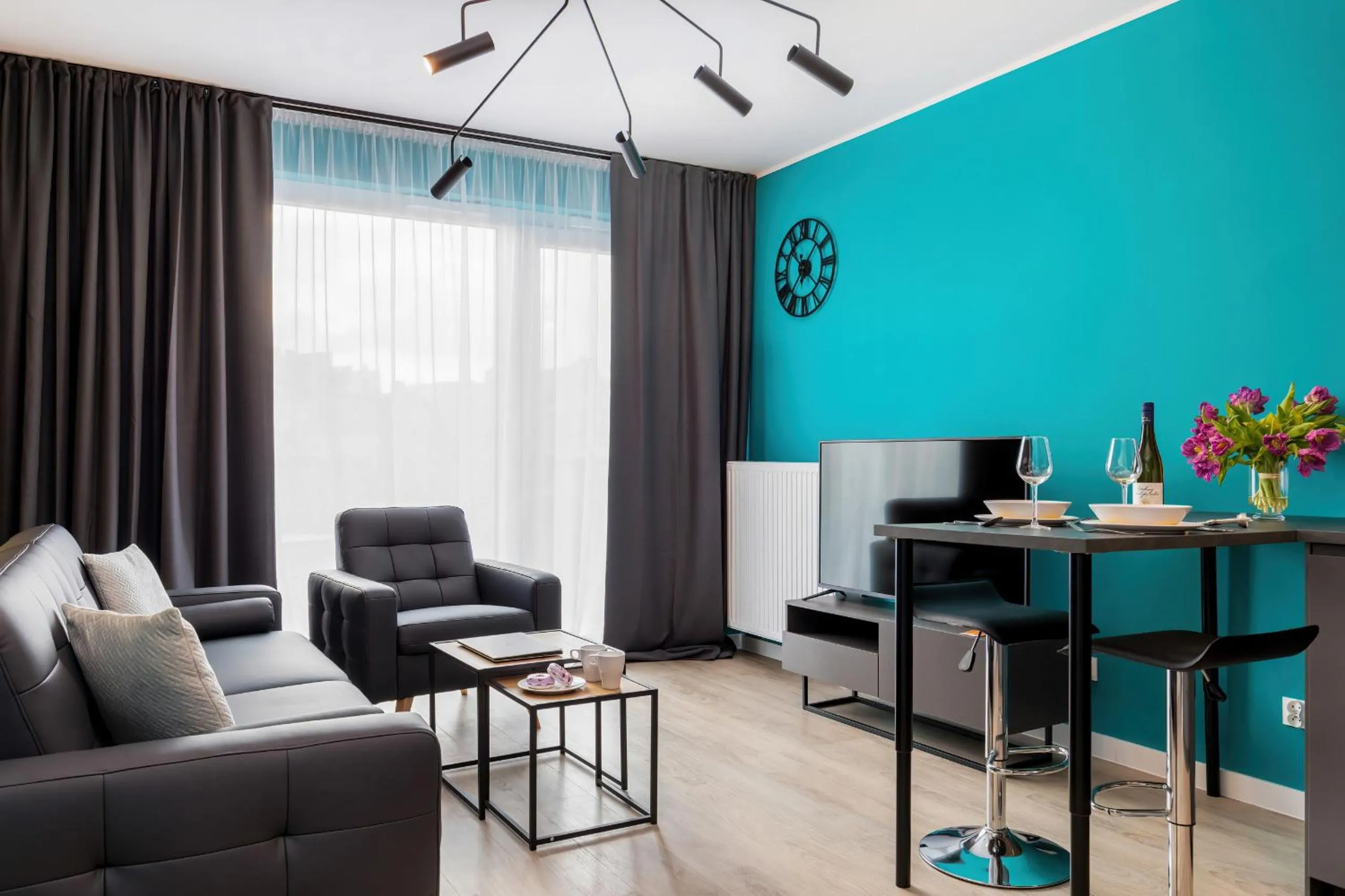 Living room in Modern City Center Apartments by Noclegi Renters