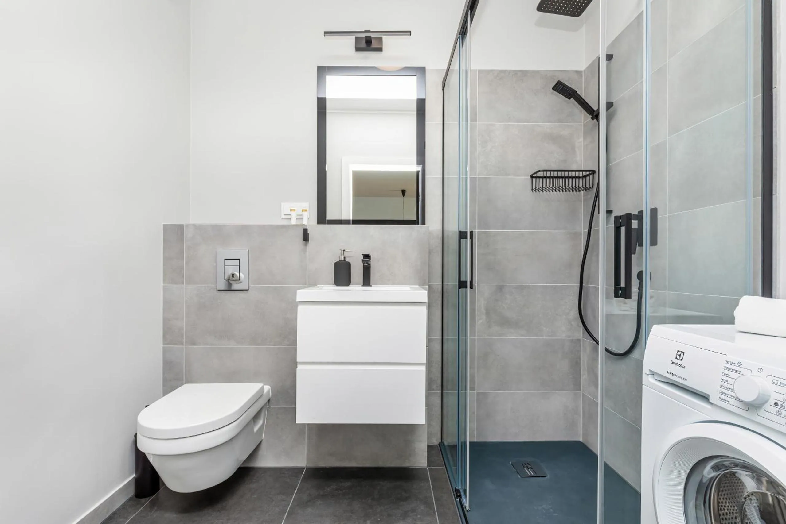 Bathroom in Modern City Center Apartments by Noclegi Renters