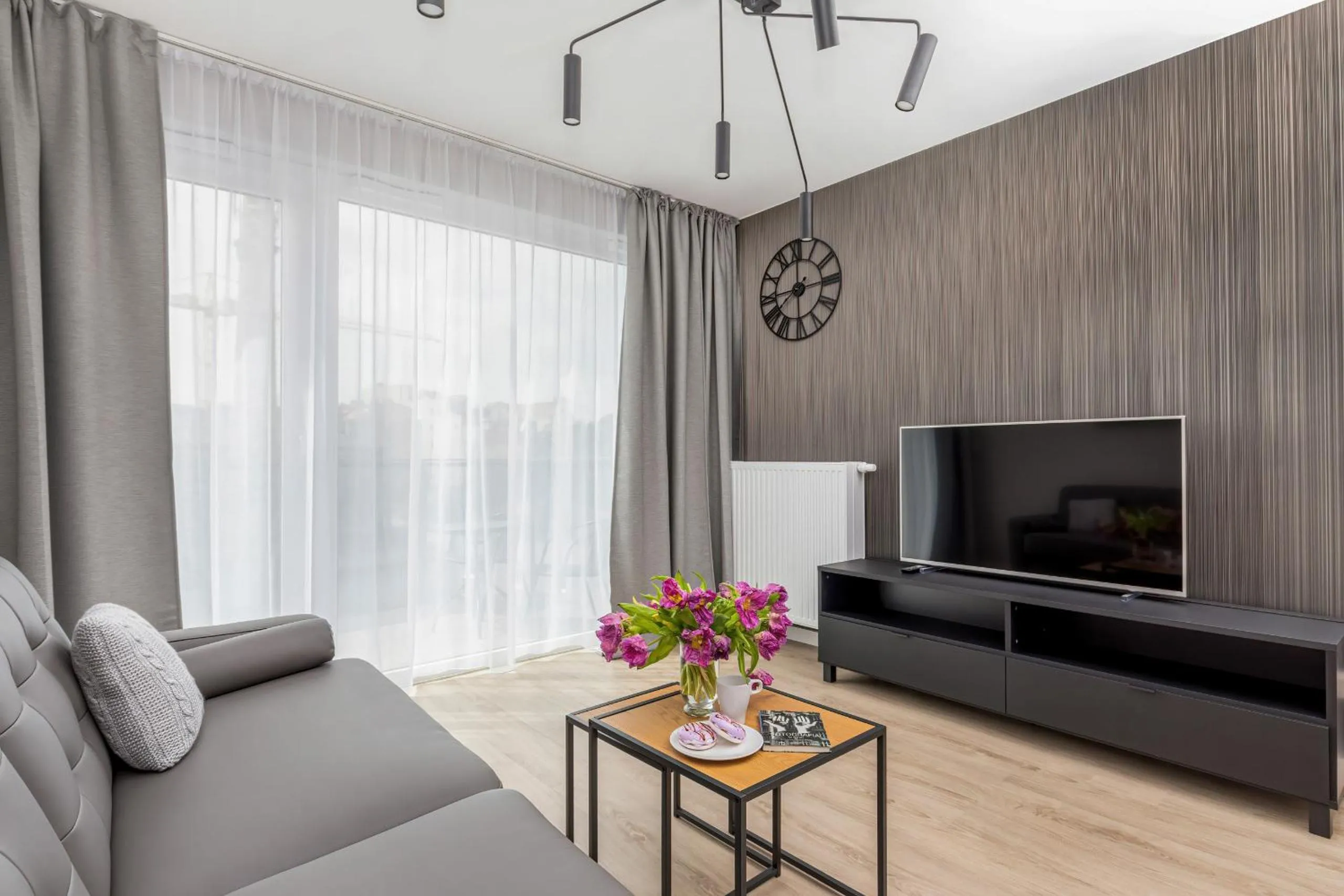 Living room in Modern City Center Apartments by Noclegi Renters