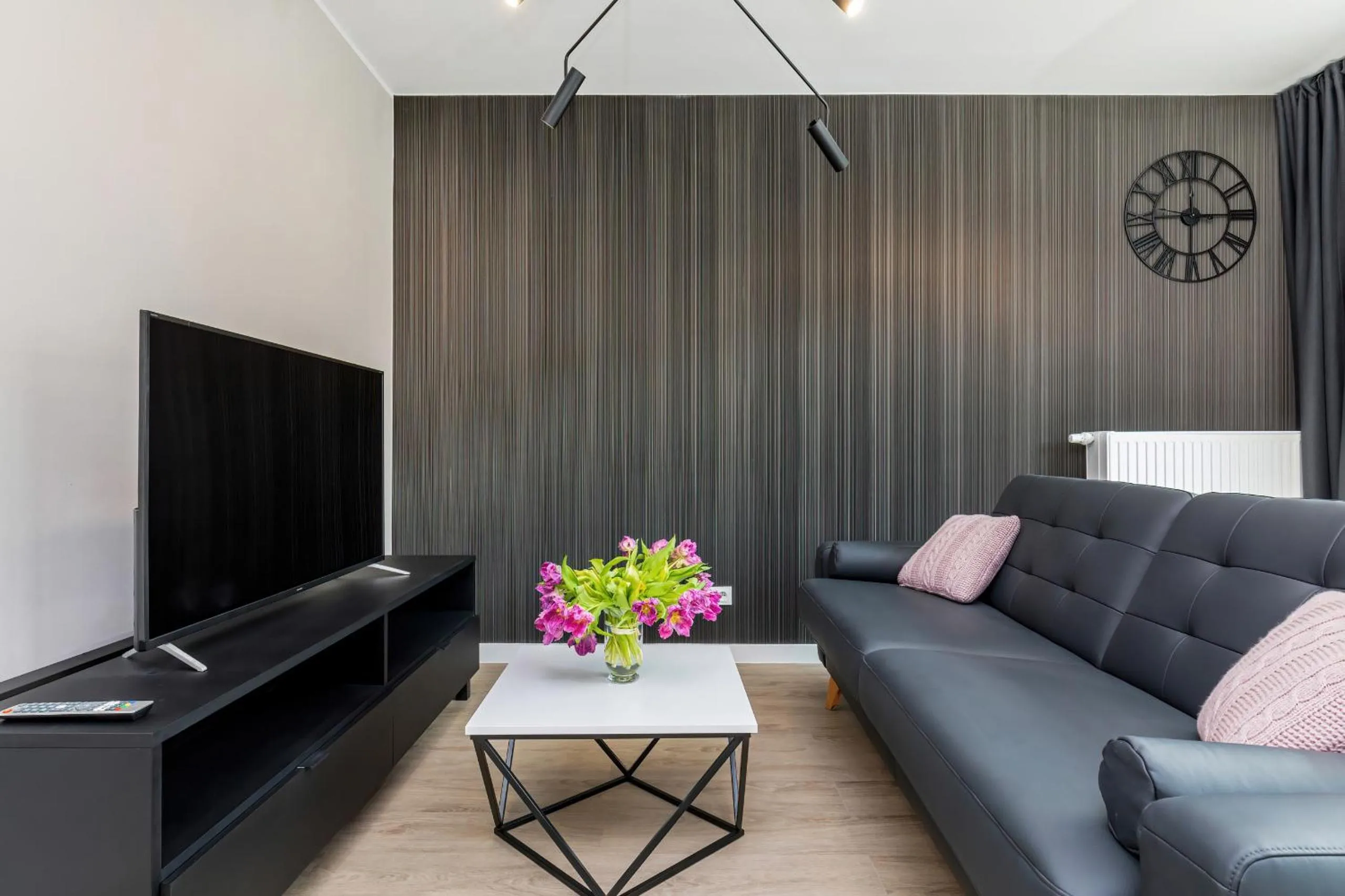 Living room in Modern City Center Apartments by Noclegi Renters