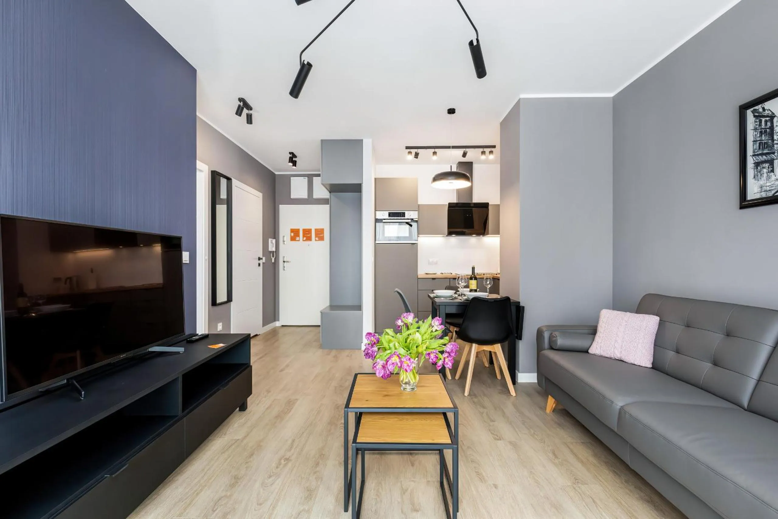 Living room in Modern City Center Apartments by Noclegi Renters
