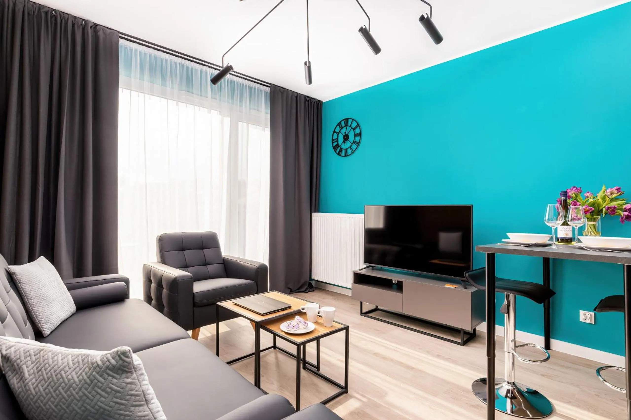 Living room in Modern City Center Apartments by Noclegi Renters