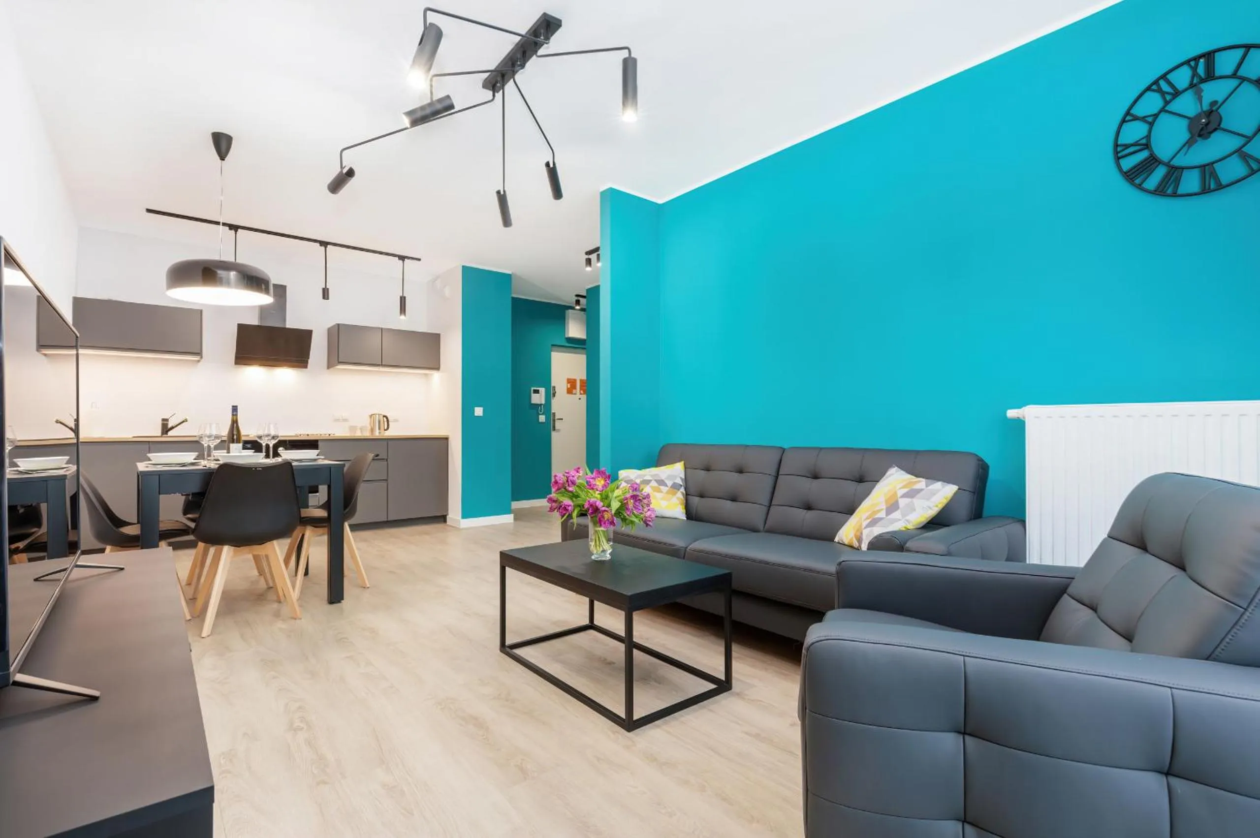 Living room in Modern City Center Apartments by Noclegi Renters