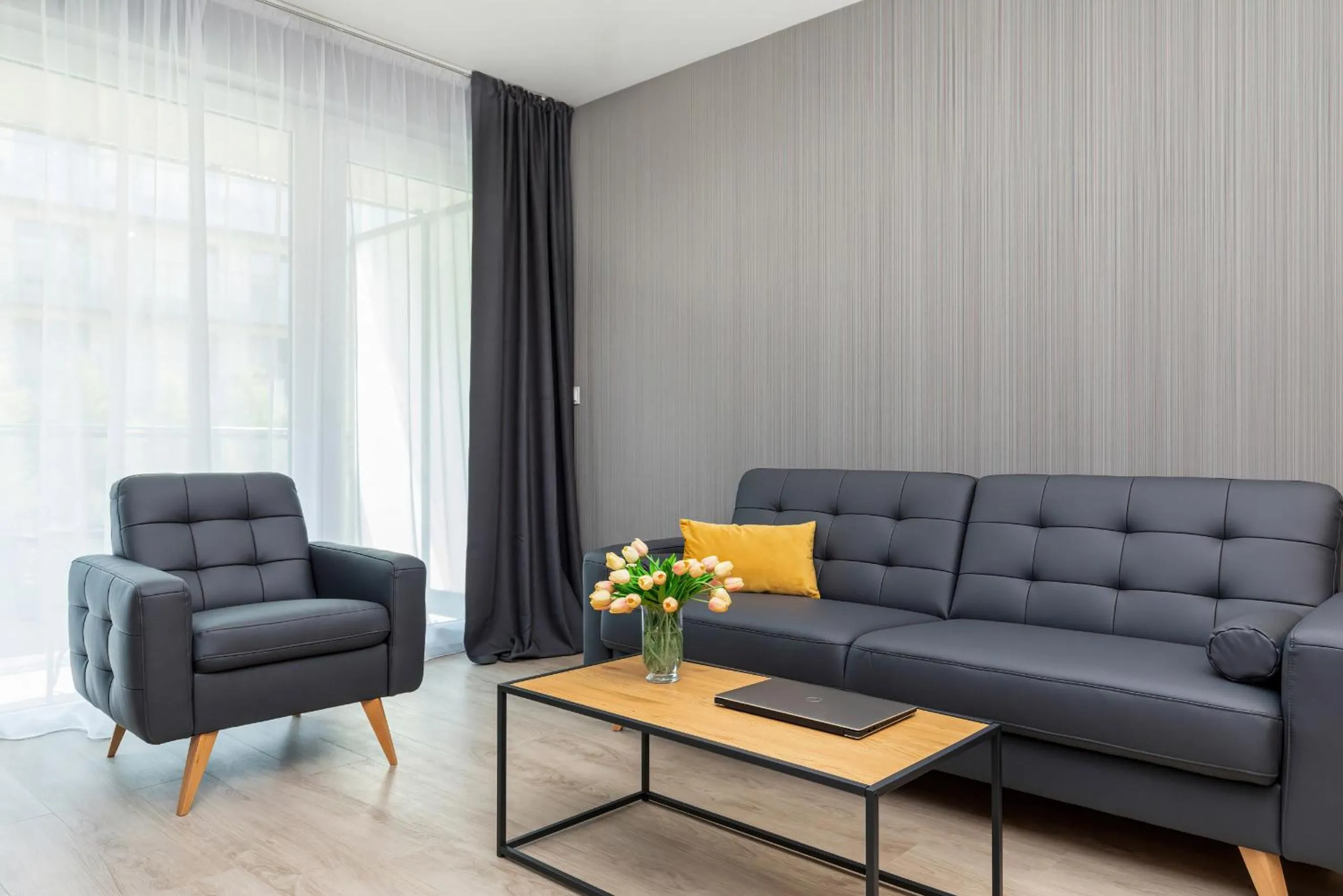 Living room in Modern City Center Apartments by Noclegi Renters