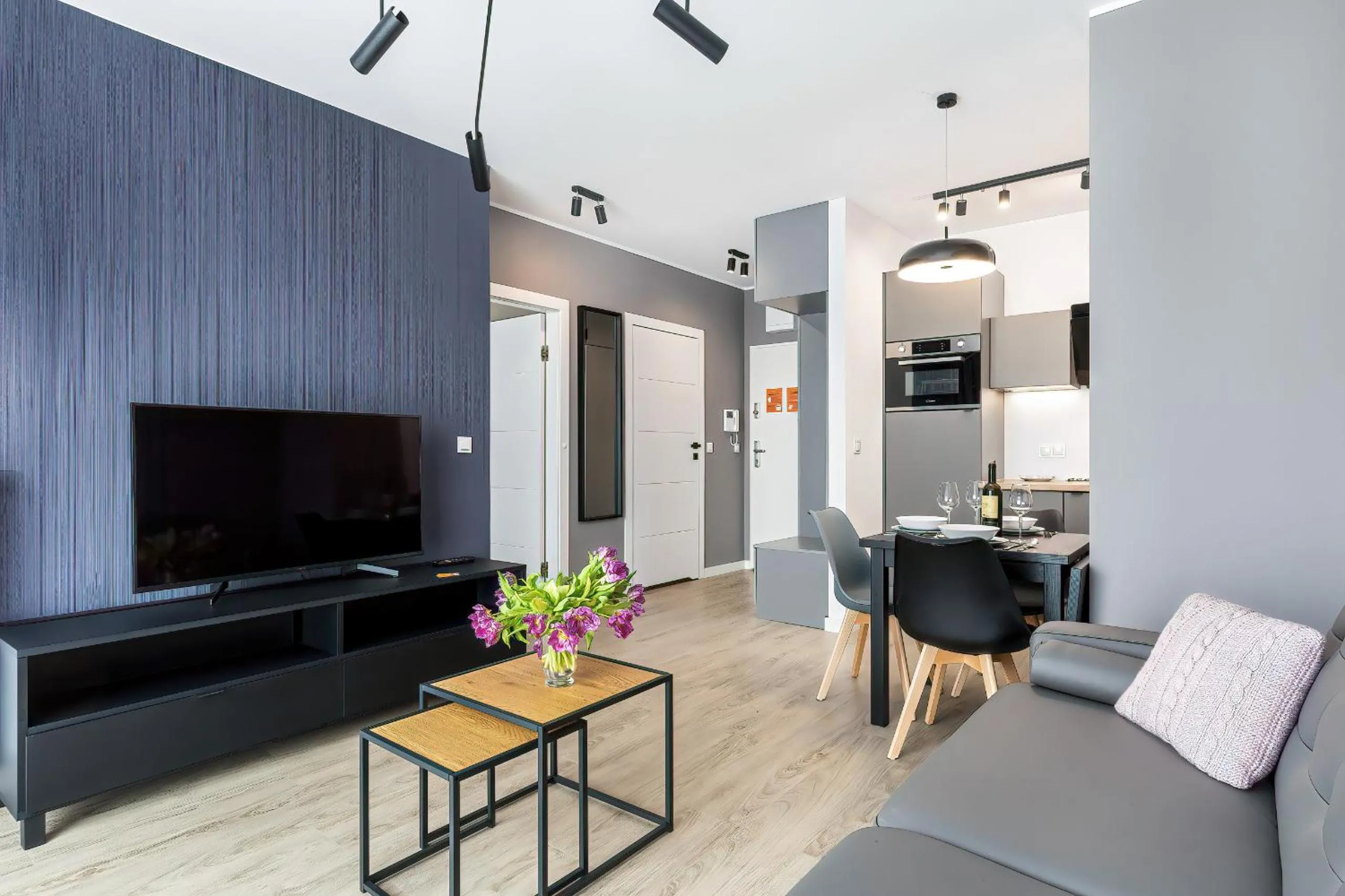 Living room in Modern City Center Apartments by Noclegi Renters