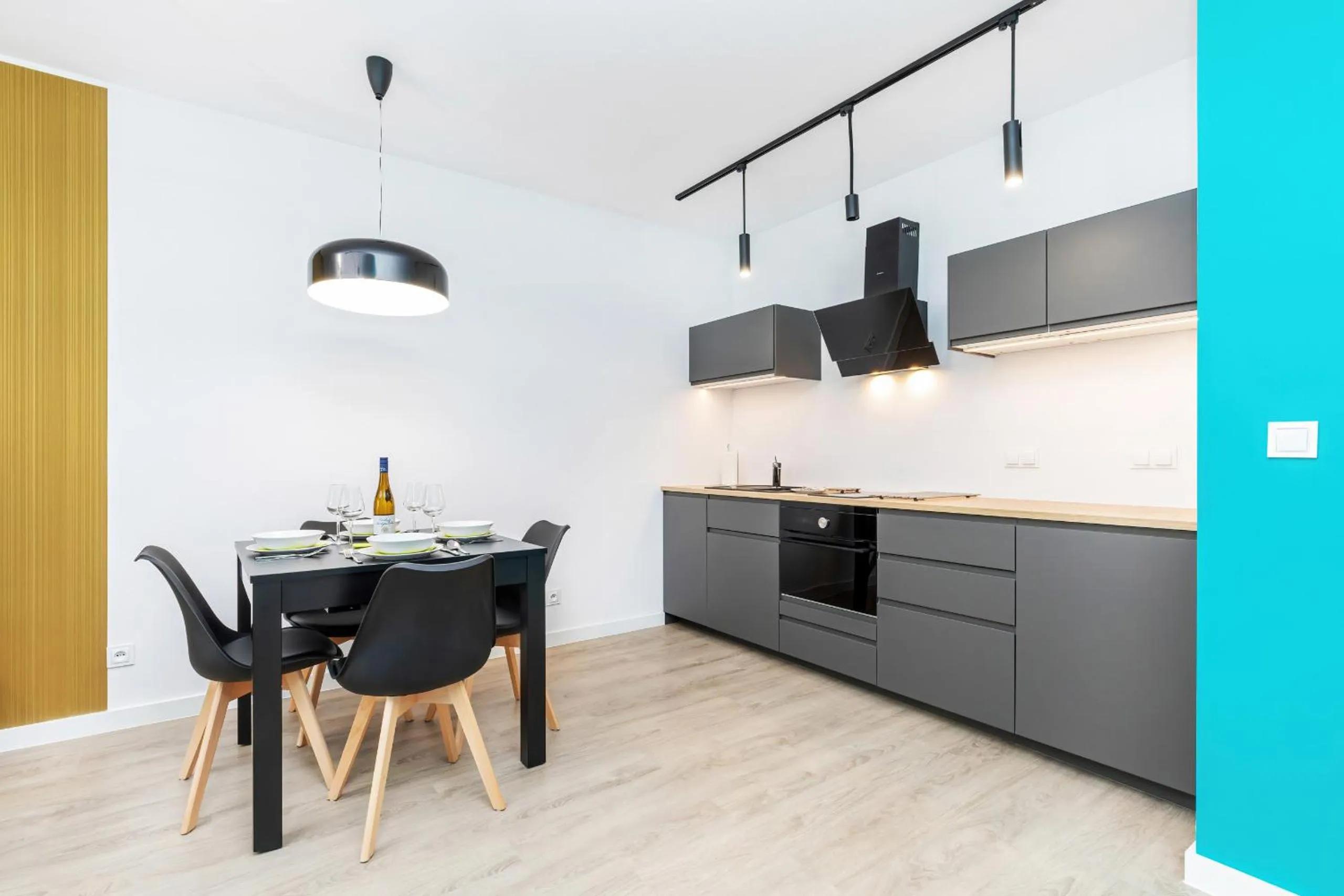 Kitchen or kitchenette in Modern City Center Apartments by Noclegi Renters