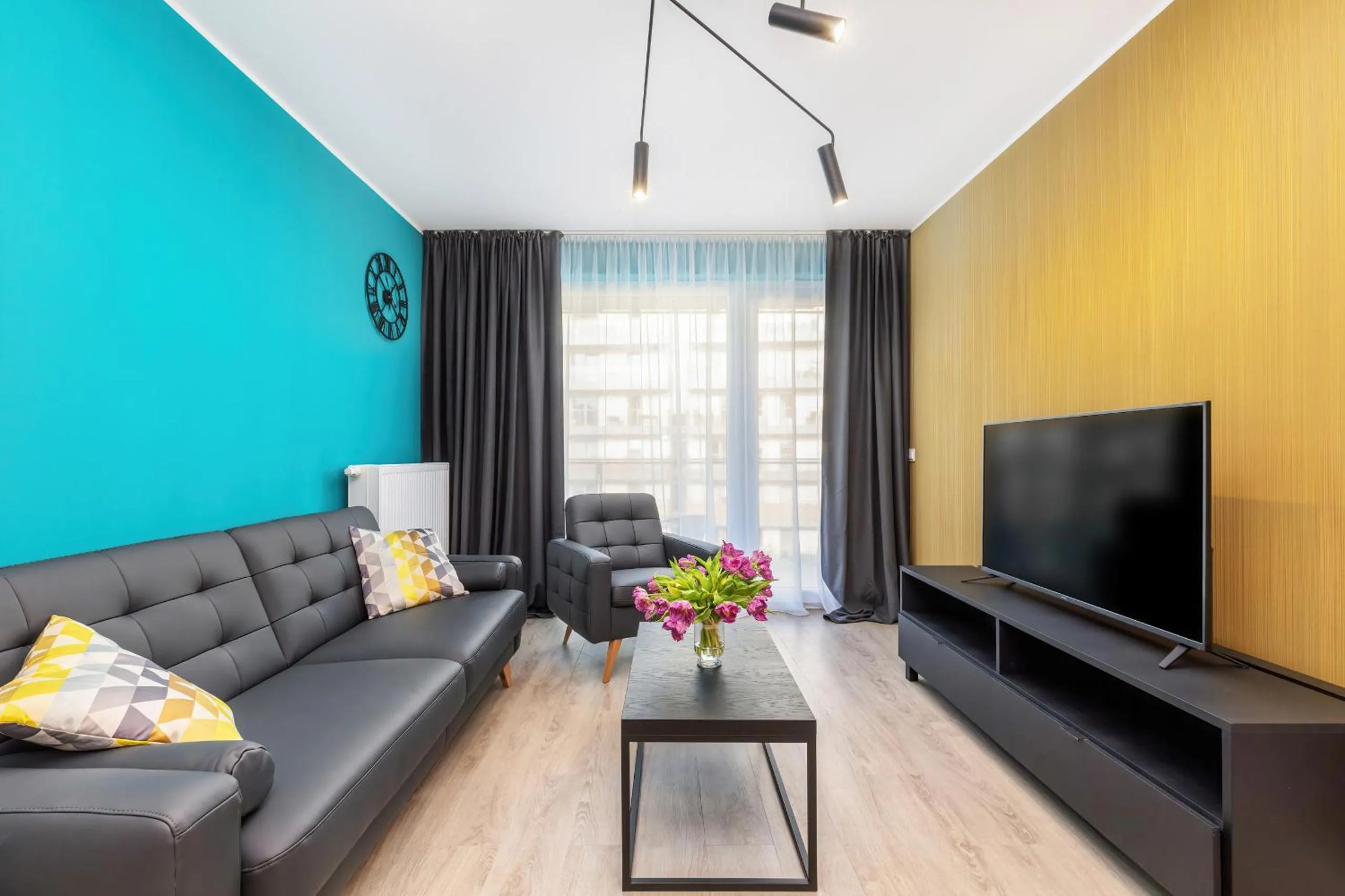 Living room in Modern City Center Apartments by Noclegi Renters