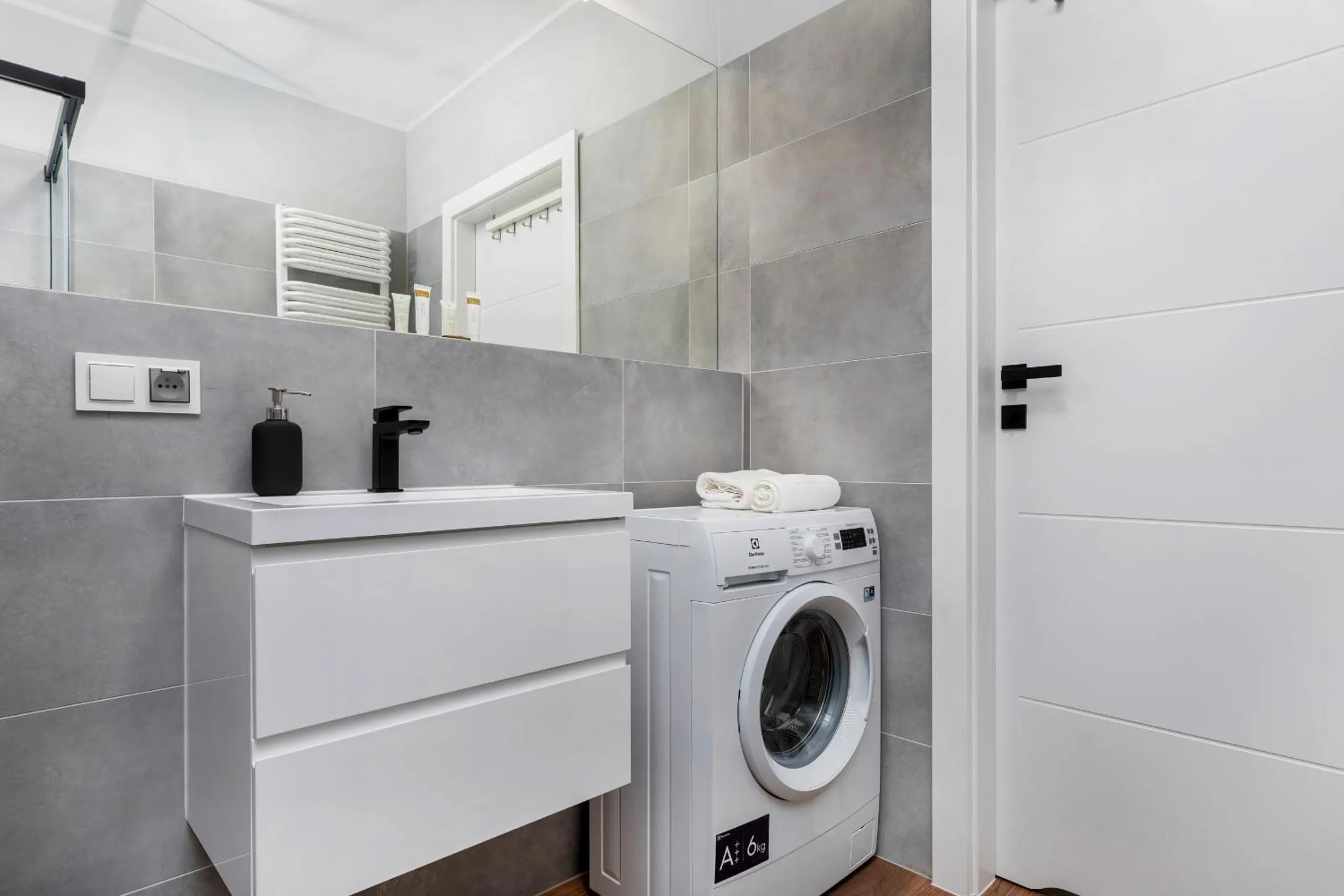 Bathroom in Modern City Center Apartments by Noclegi Renters
