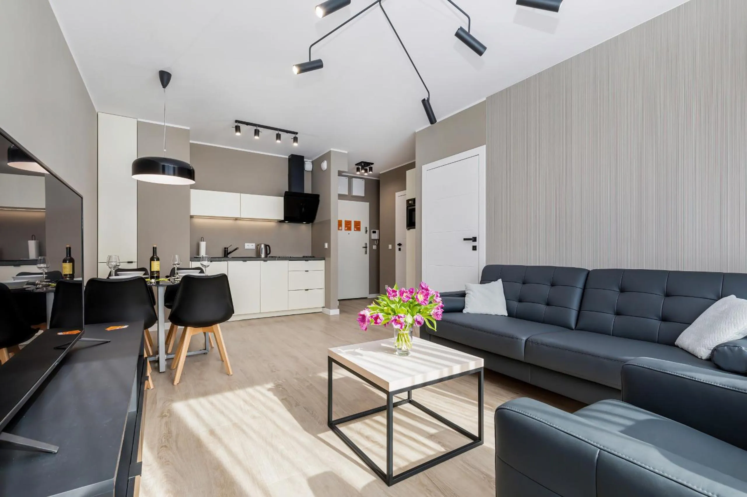 Living room in Modern City Center Apartments by Noclegi Renters