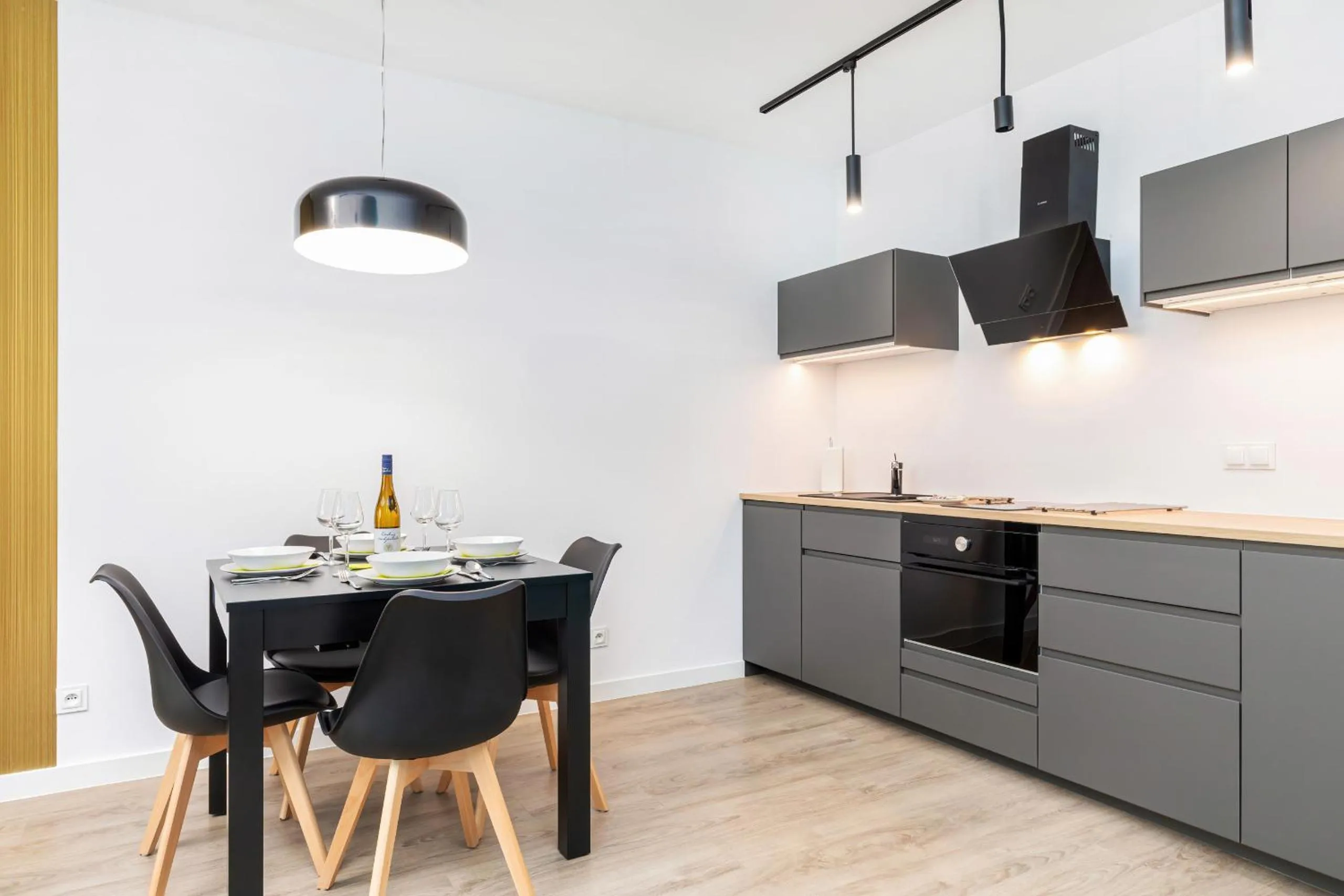 Kitchen or kitchenette in Modern City Center Apartments by Noclegi Renters